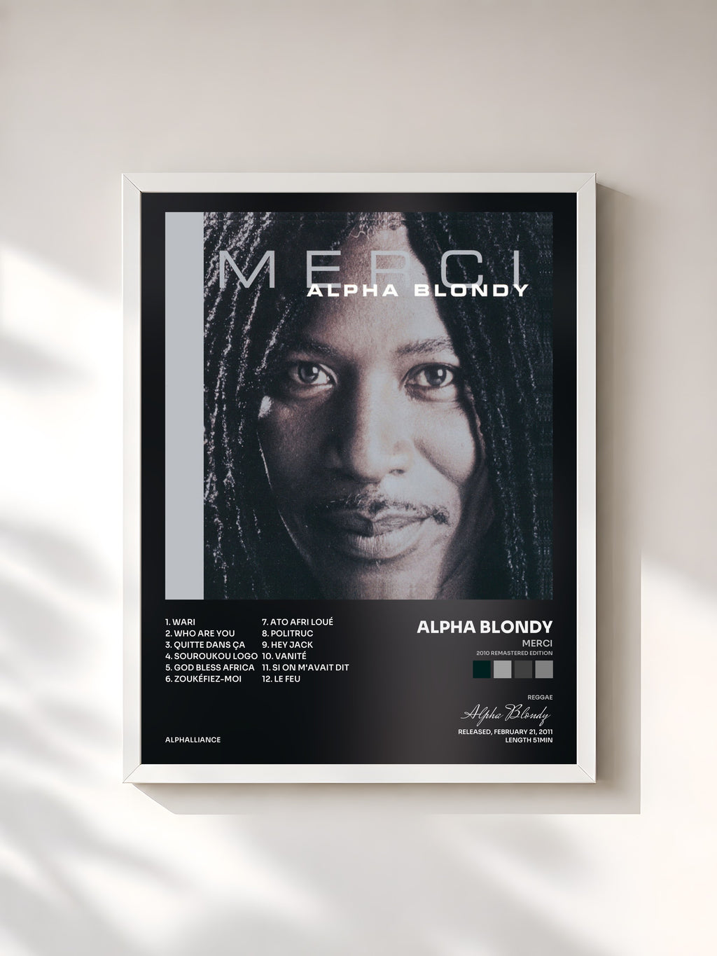 #blanc Tableau de l'album Merci (2010 Remastered Edition) de Alpha Blondy, cadre blanc, imprimé et encadré en France