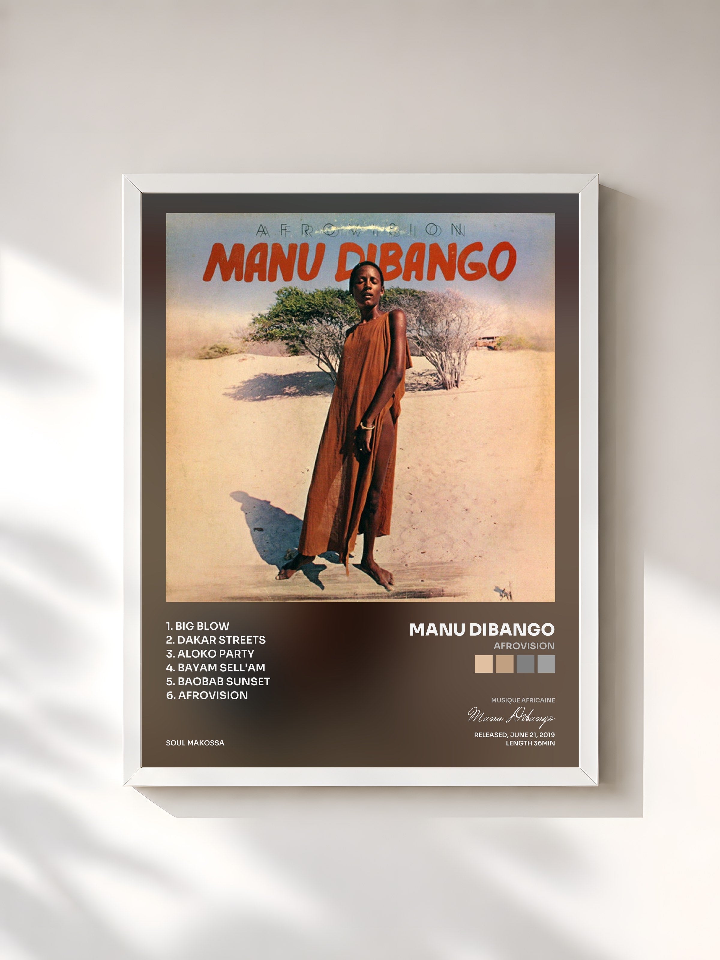 #blanc Tableau de l'album Afrovision de Manu Dibango, cadre blanc, imprimé et encadré en France