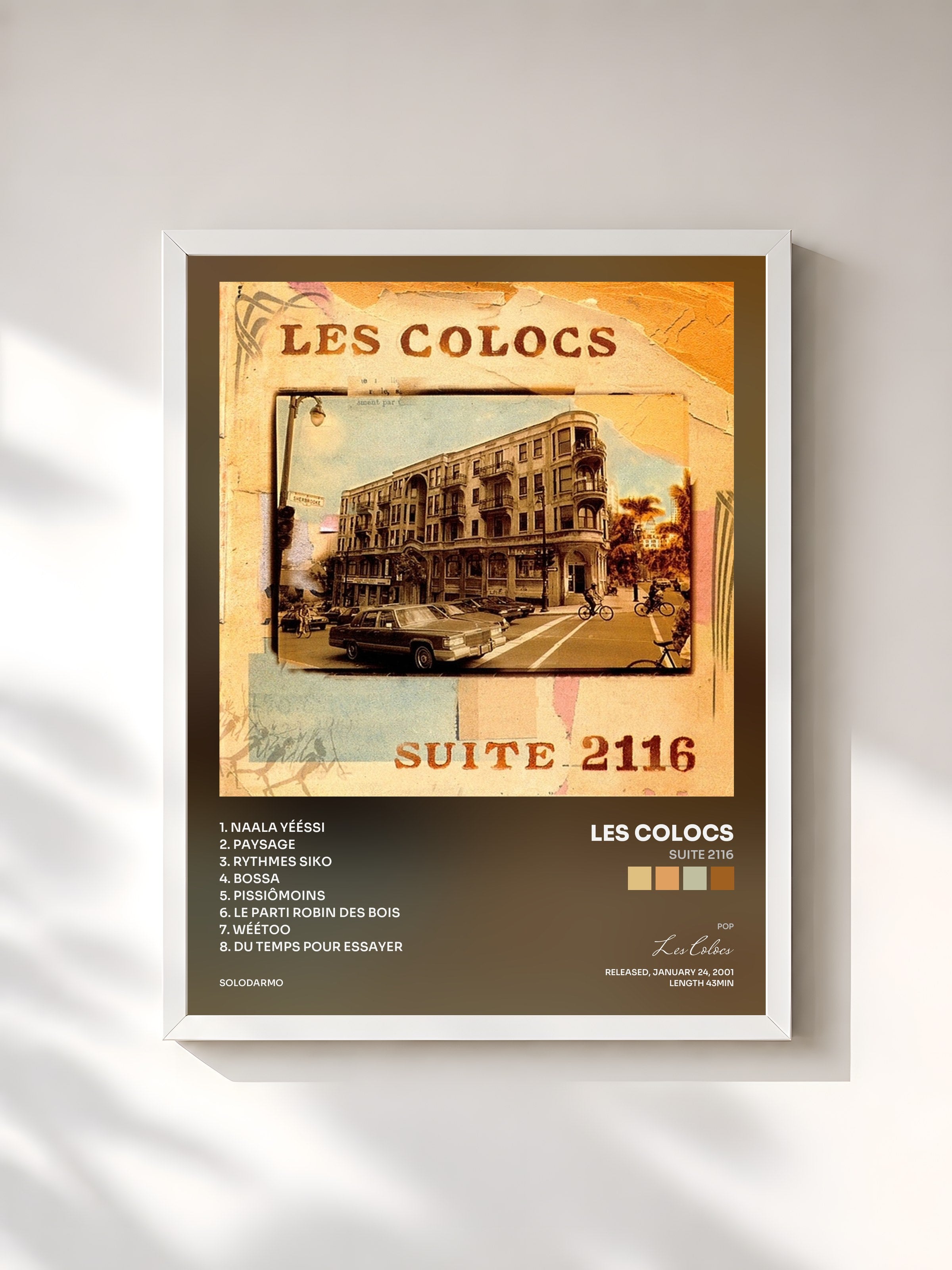 #blanc Tableau de l'album Suite 2116 de Les Colocs, cadre blanc, imprimé et encadré en France