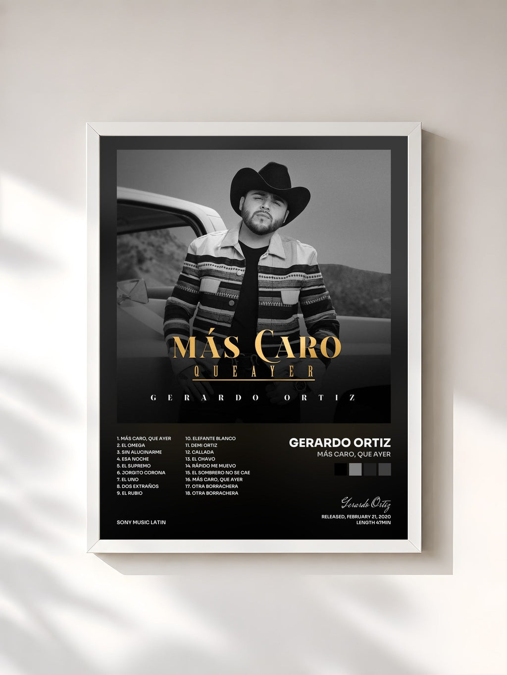 #blanc Más Caro, que ayer by Gerardo Ortiz as a framed art print, white frame, printed and framed in France