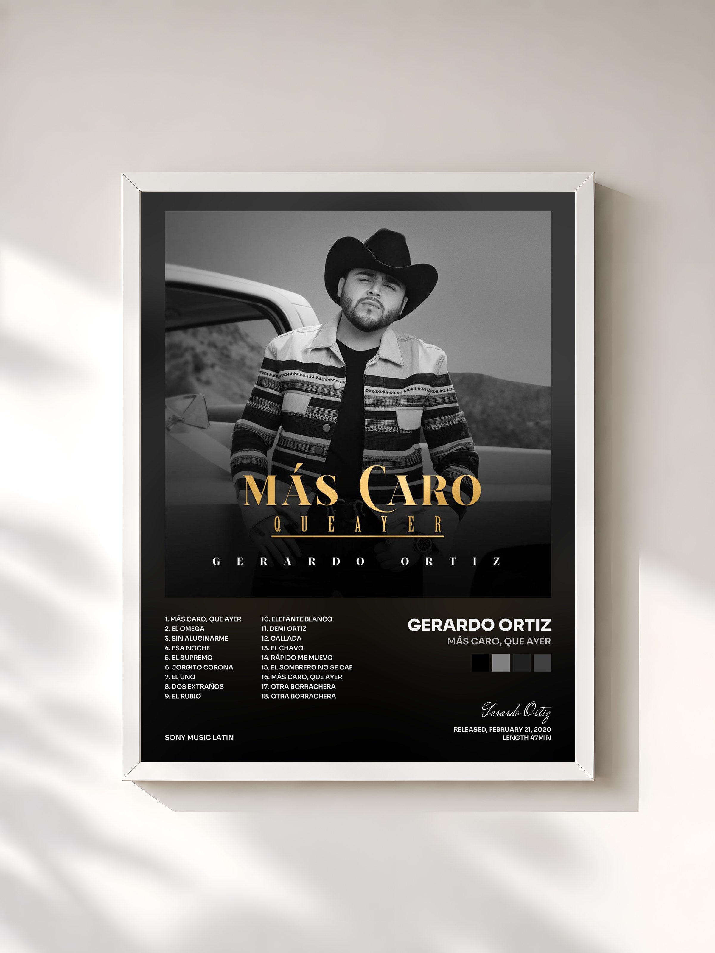 #blanc Tableau de l'album Más Caro, que ayer de Gerardo Ortiz, cadre blanc, imprimé et encadré en France