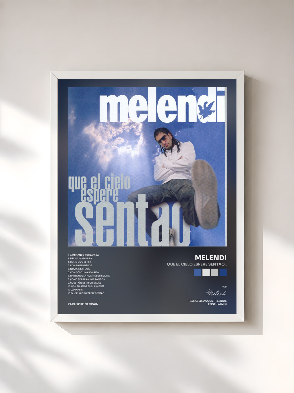 #blanc Que El Cielo Espere Sentao.. by Melendi as a framed art print, white frame, printed and framed in France