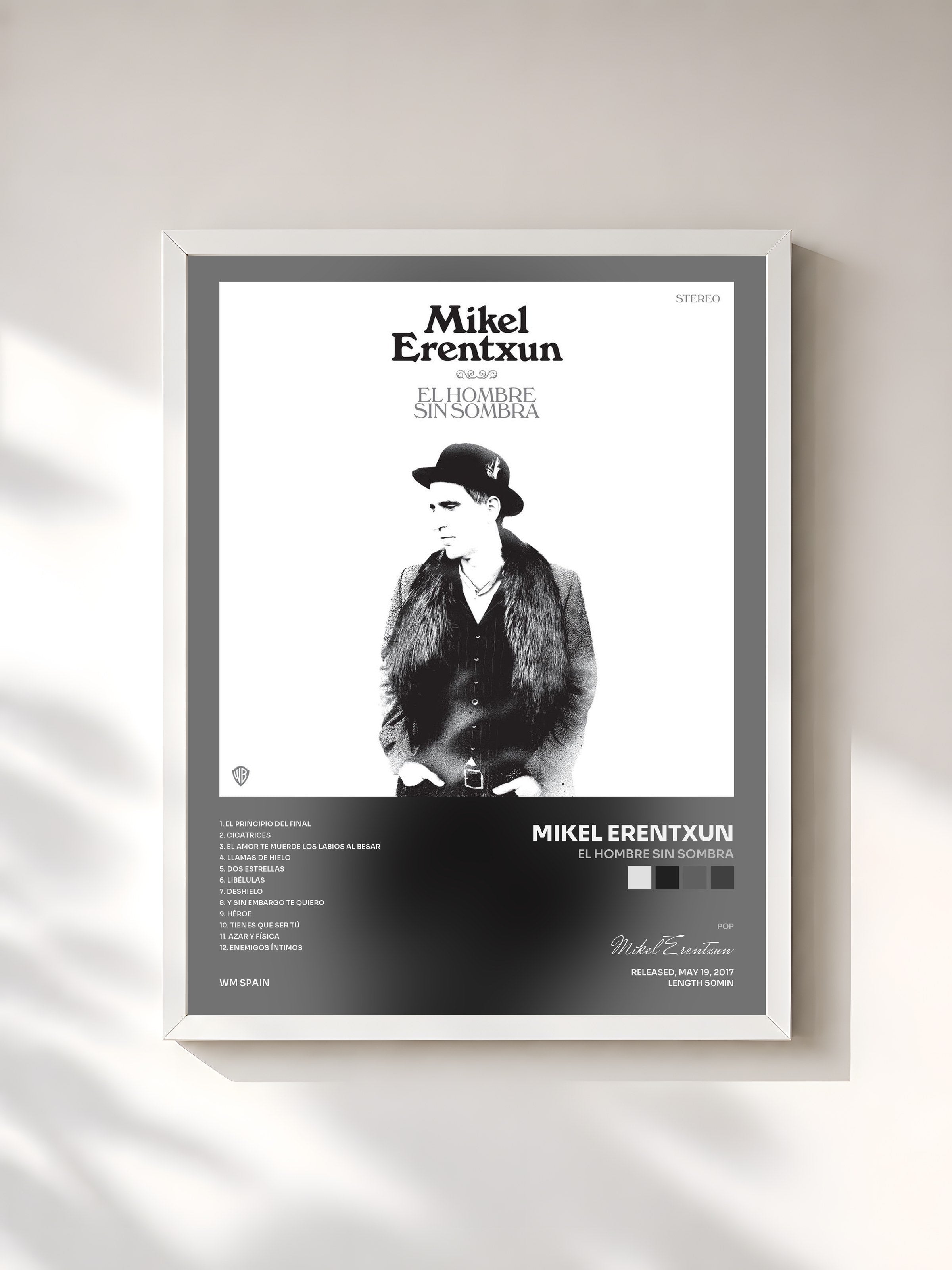 #blanc Tableau de l'album El hombre sin sombra de Mikel Erentxun, cadre blanc, imprimé et encadré en France