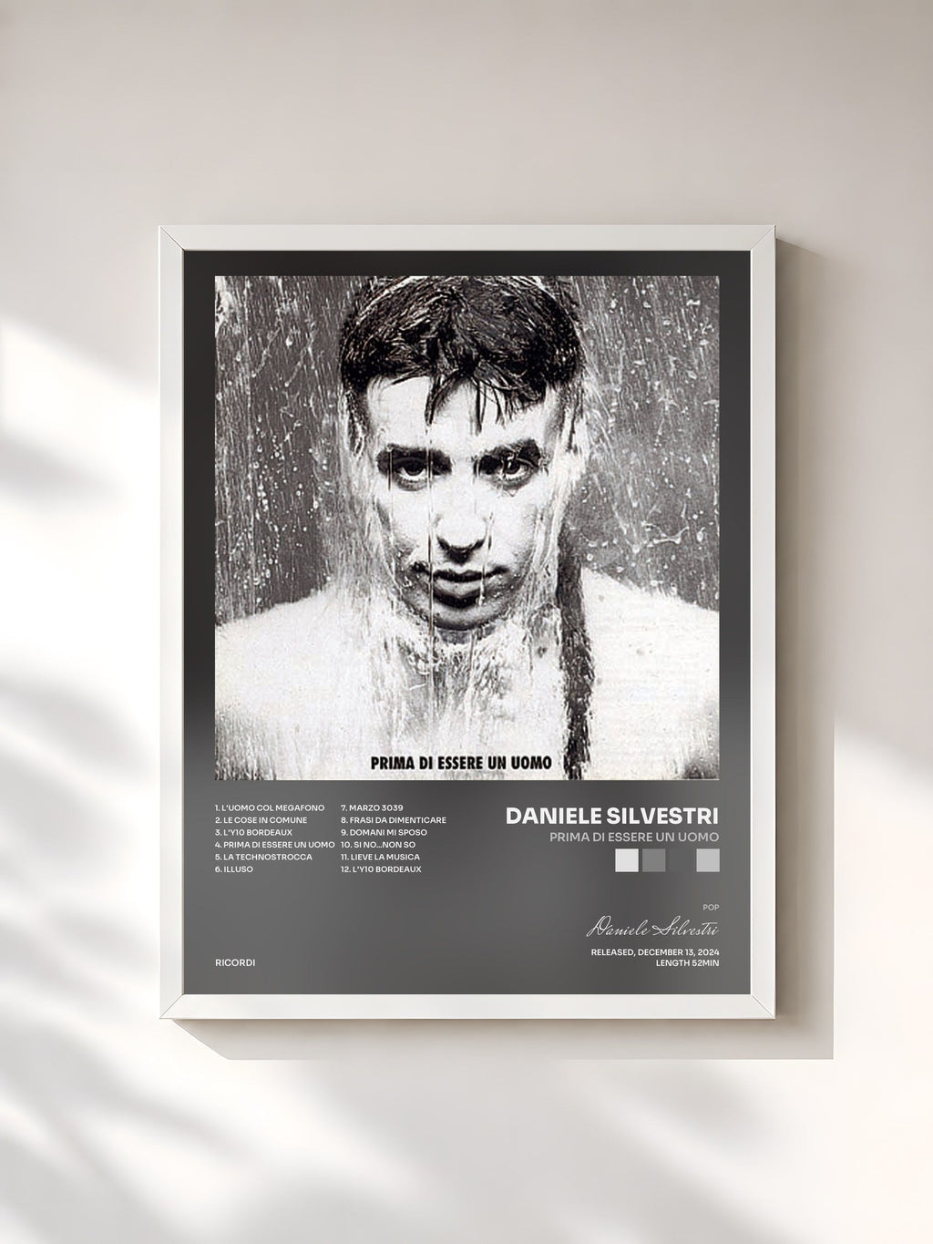 #blanc Prima Di Essere Un Uomo by Daniele Silvestri as a framed art print, white frame, printed and framed in France