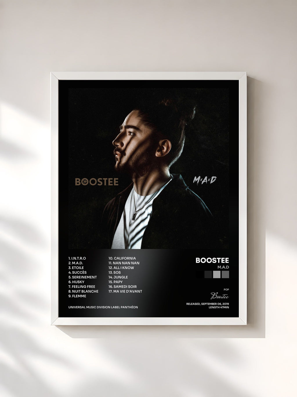 #blanc M.A.D by Boostee as a framed art print, white frame, printed and framed in France