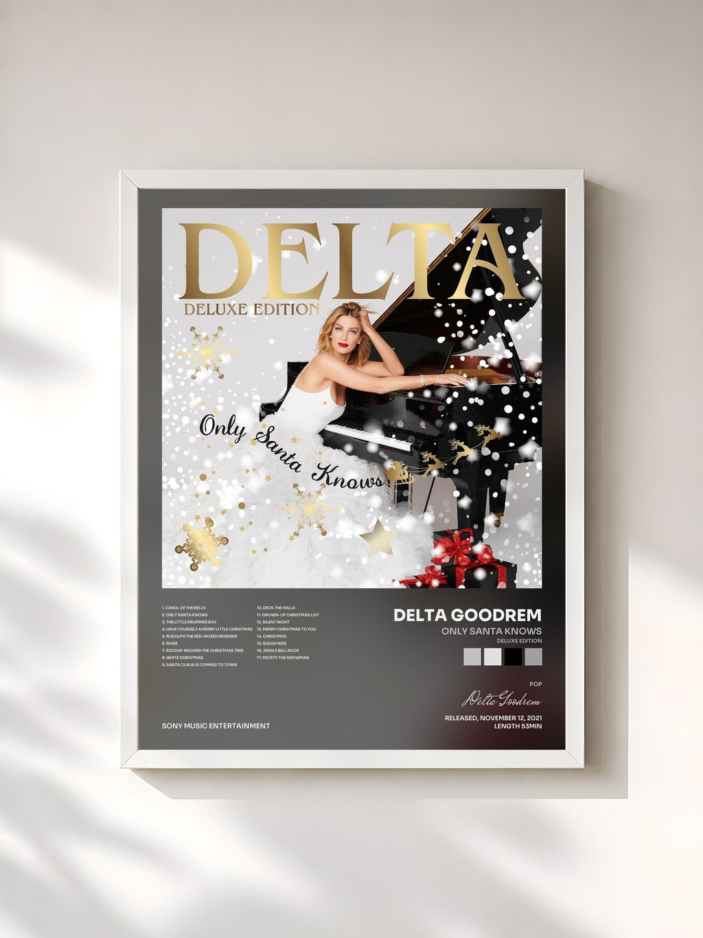 #blanc Only Santa Knows (Deluxe Edition) by Delta Goodrem as a framed art print, white frame, printed and framed in France