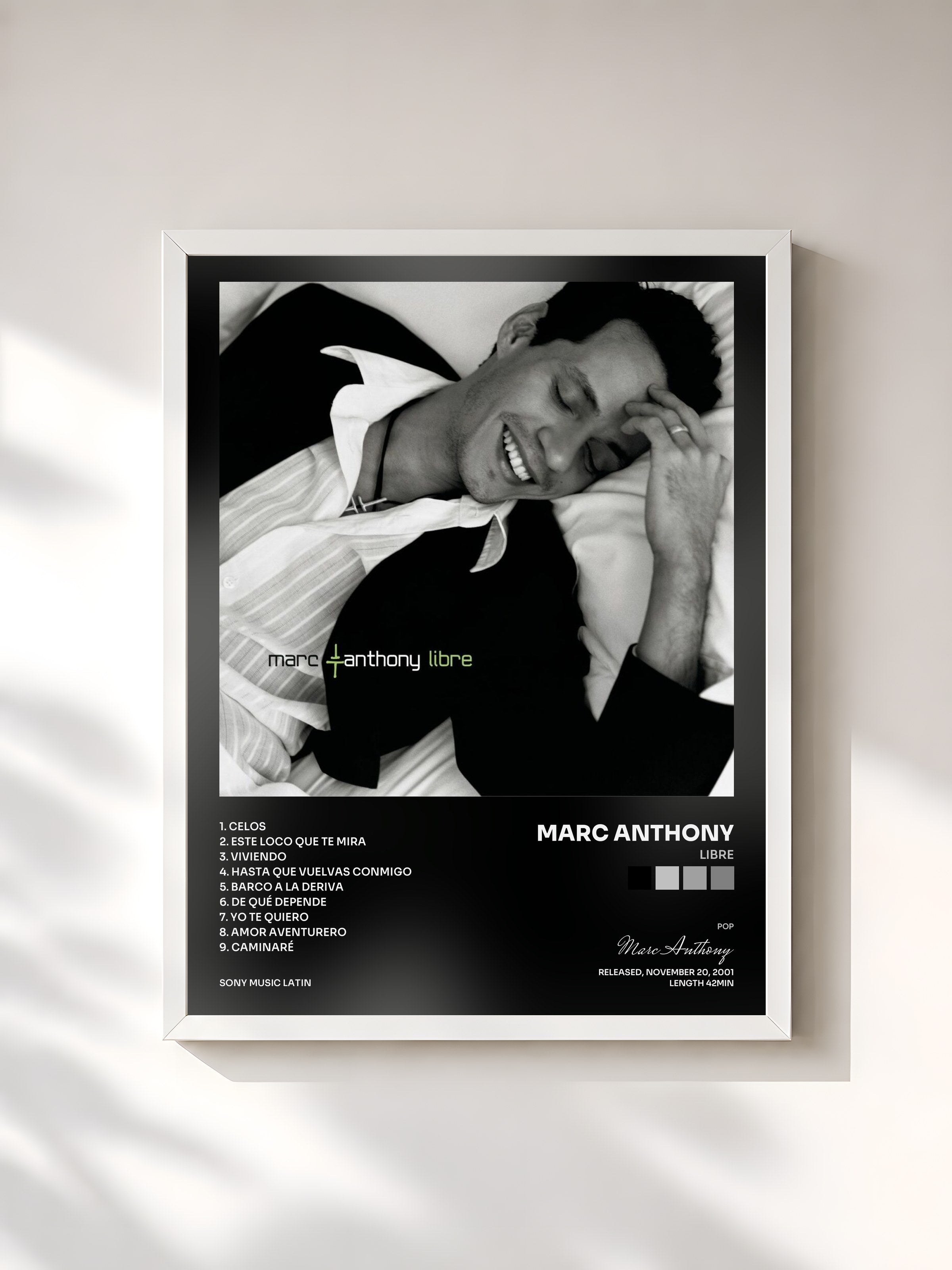 #blanc Tableau de l'album Libre de Marc Anthony, cadre blanc, imprimé et encadré en France