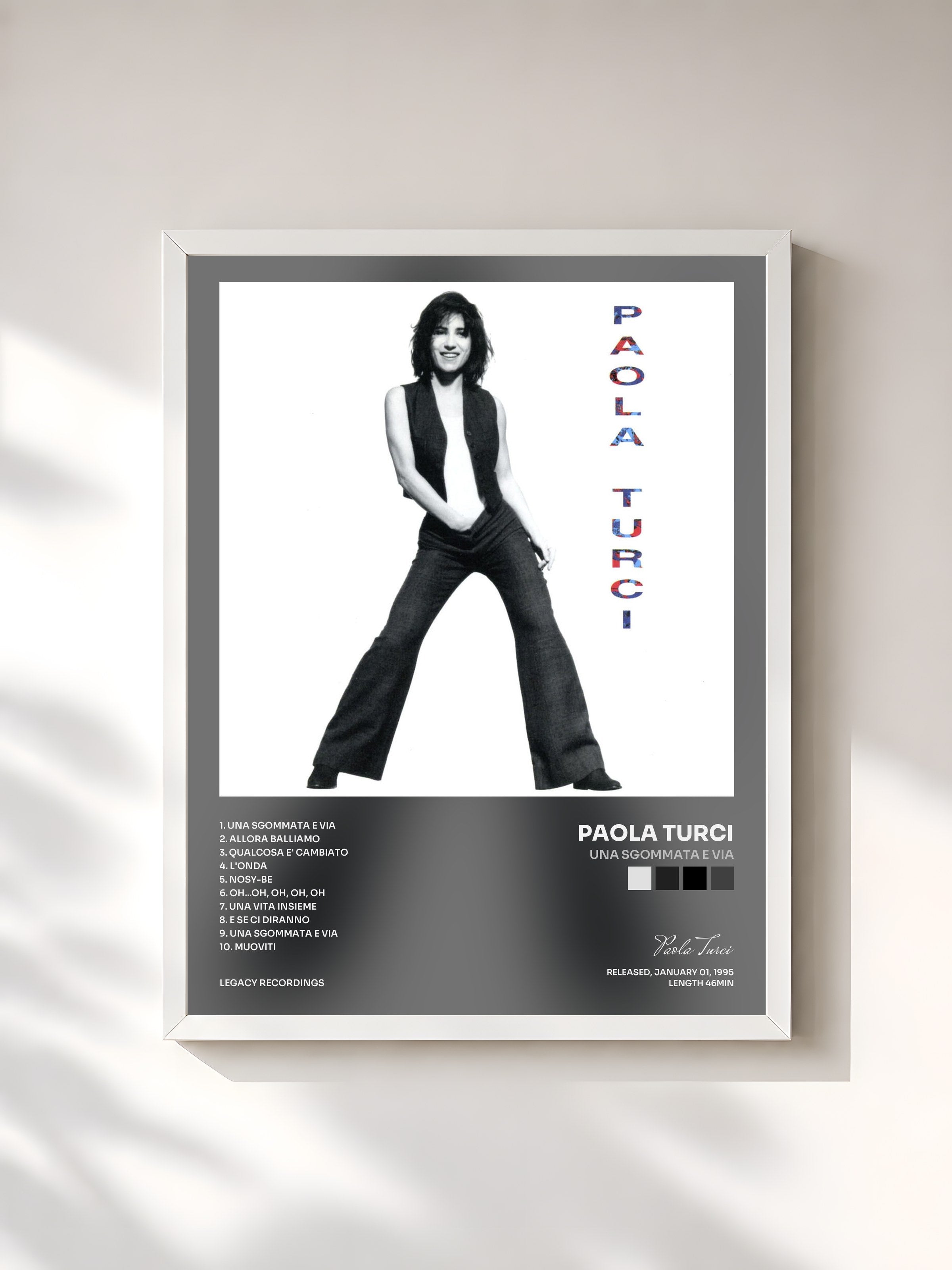 #blanc Tableau de l'album Una sgommata e via de Paola Turci, cadre blanc, imprimé et encadré en France