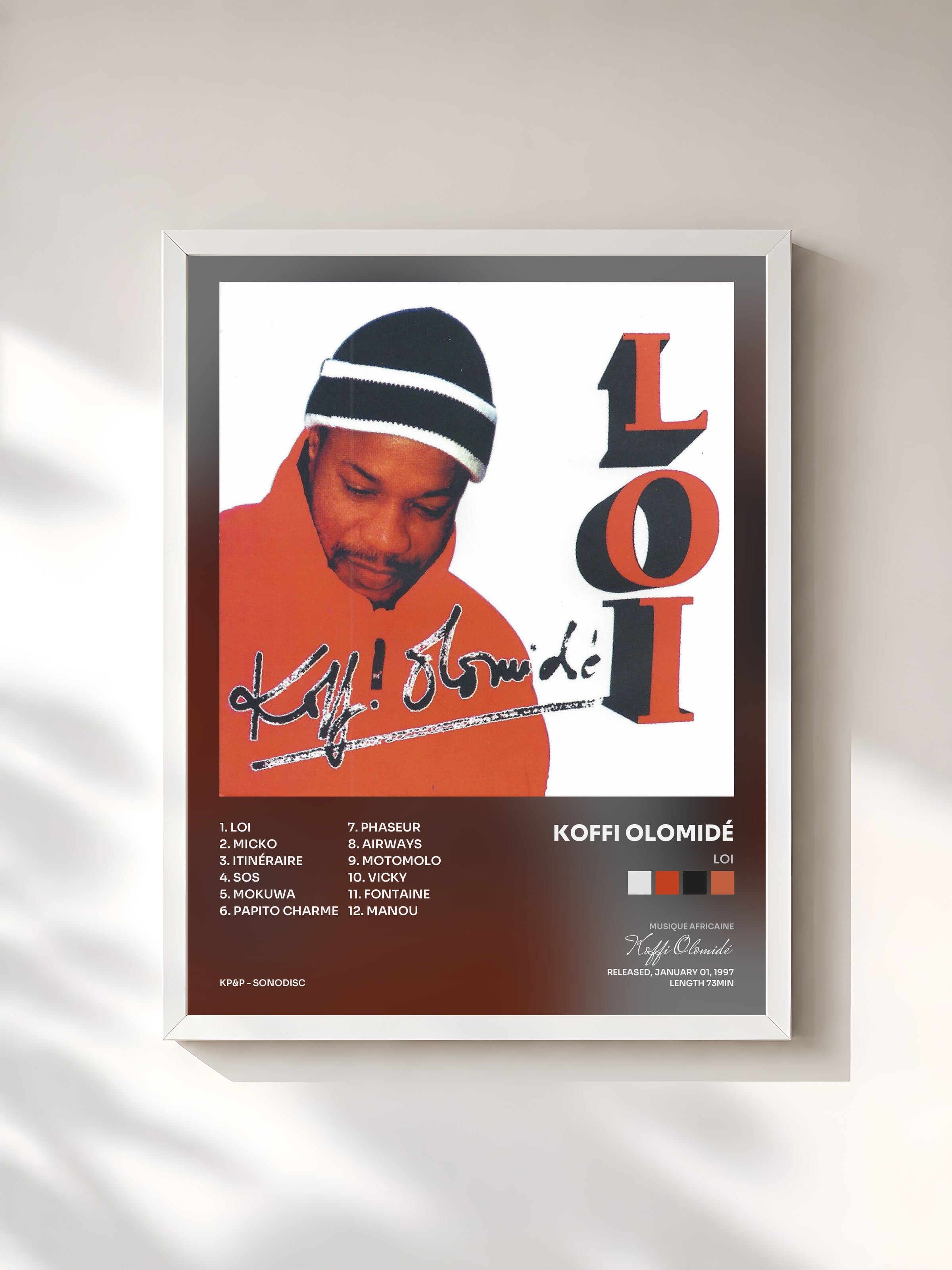 #blanc Tableau de l'album Loi de Koffi Olomidé, cadre blanc, imprimé et encadré en France