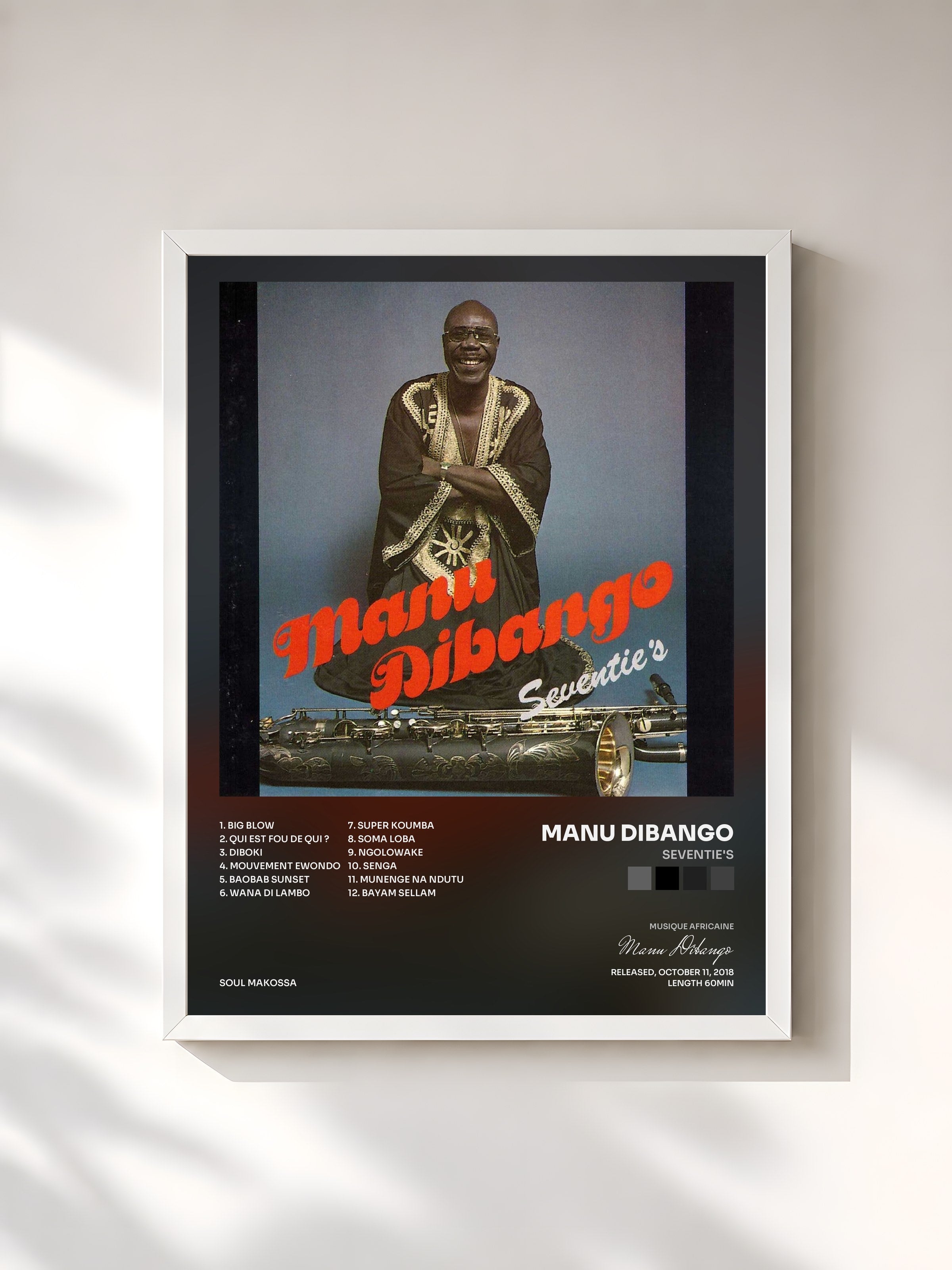 #blanc Tableau de l'album Seventie's de Manu Dibango, cadre blanc, imprimé et encadré en France