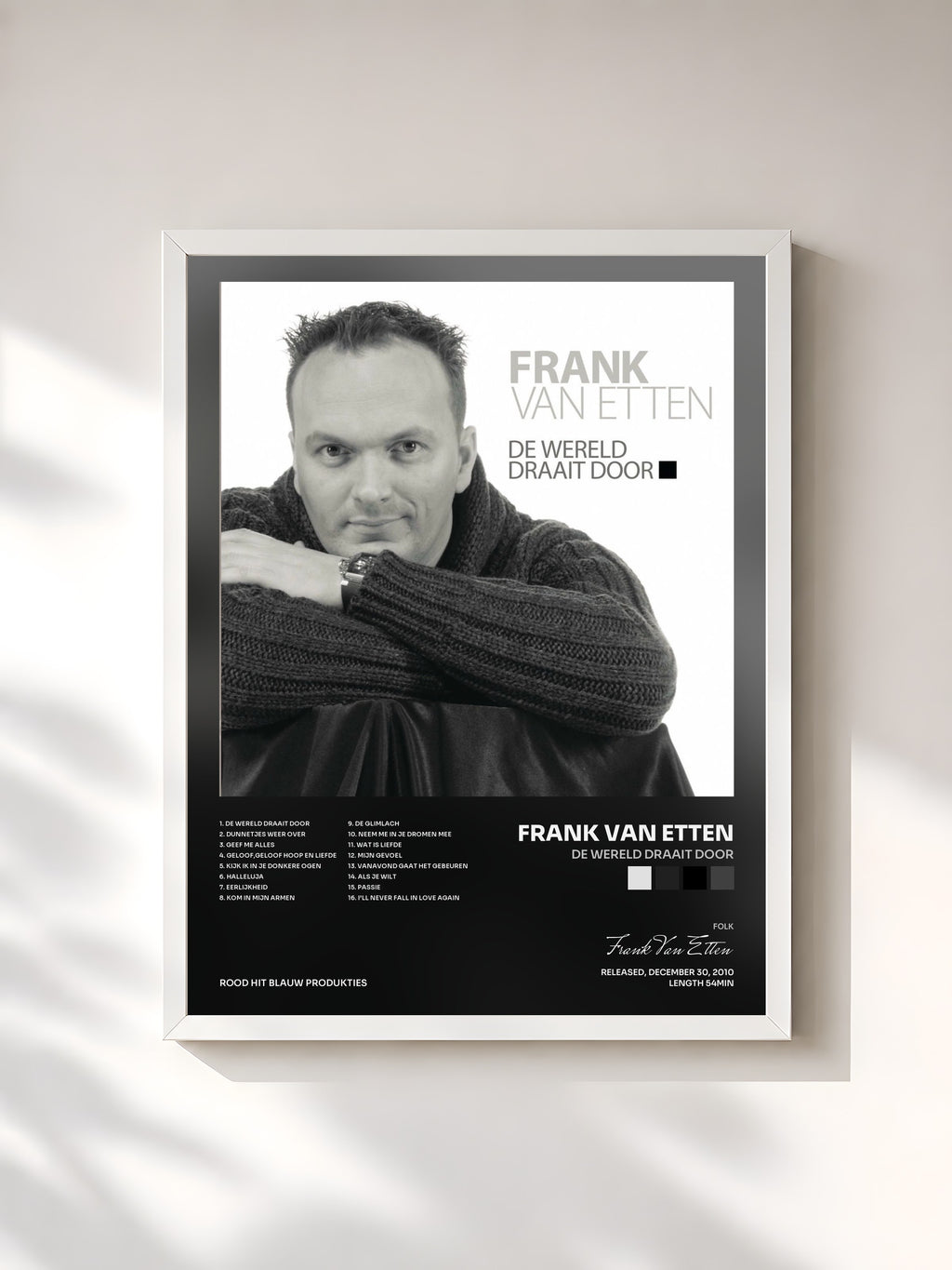 #blanc De wereld draait door by Frank Van Etten as a framed art print, white frame, printed and framed in France