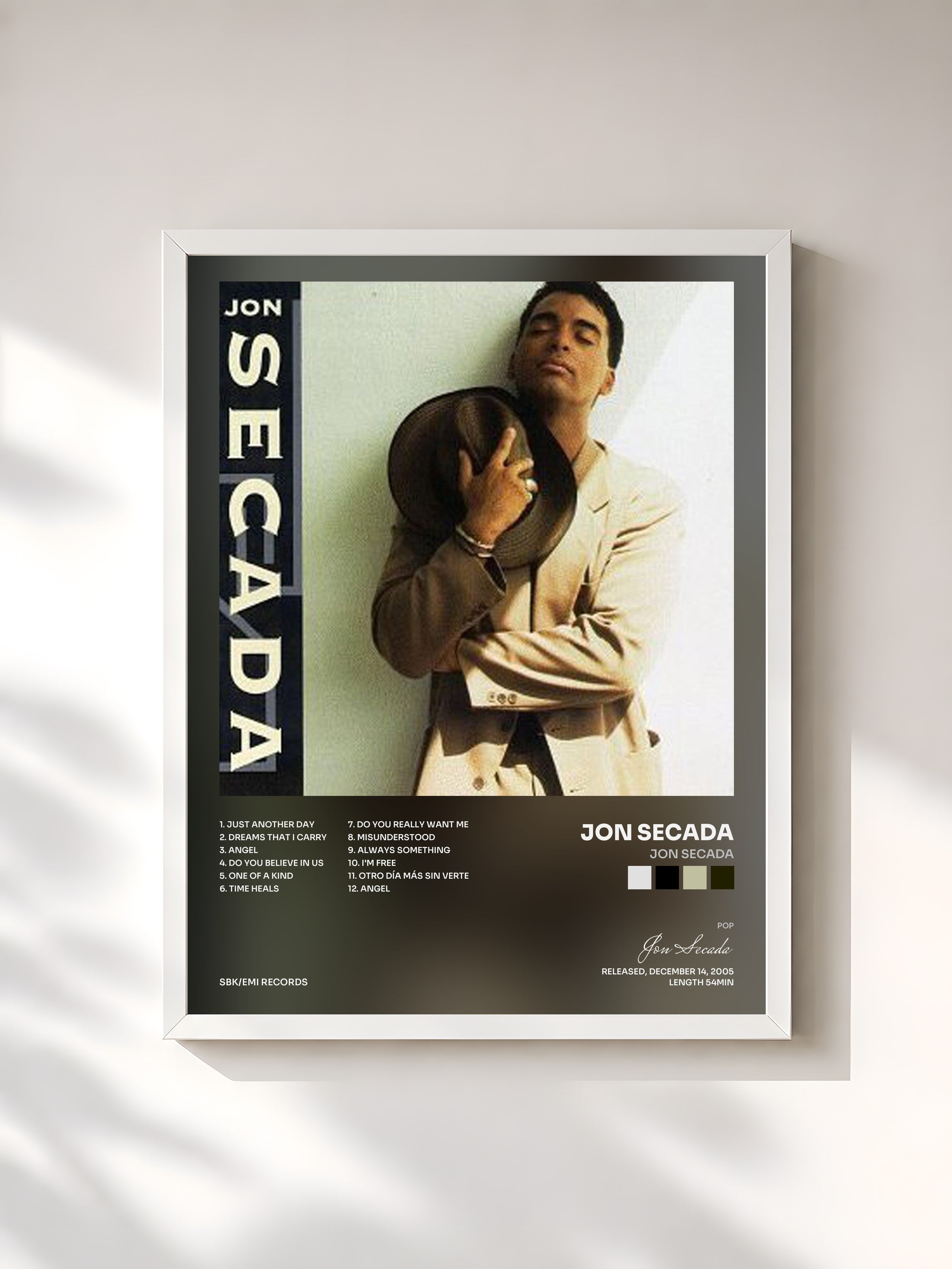 #blanc Tableau de l'album Jon Secada de Jon Secada, cadre blanc, imprimé et encadré en France
