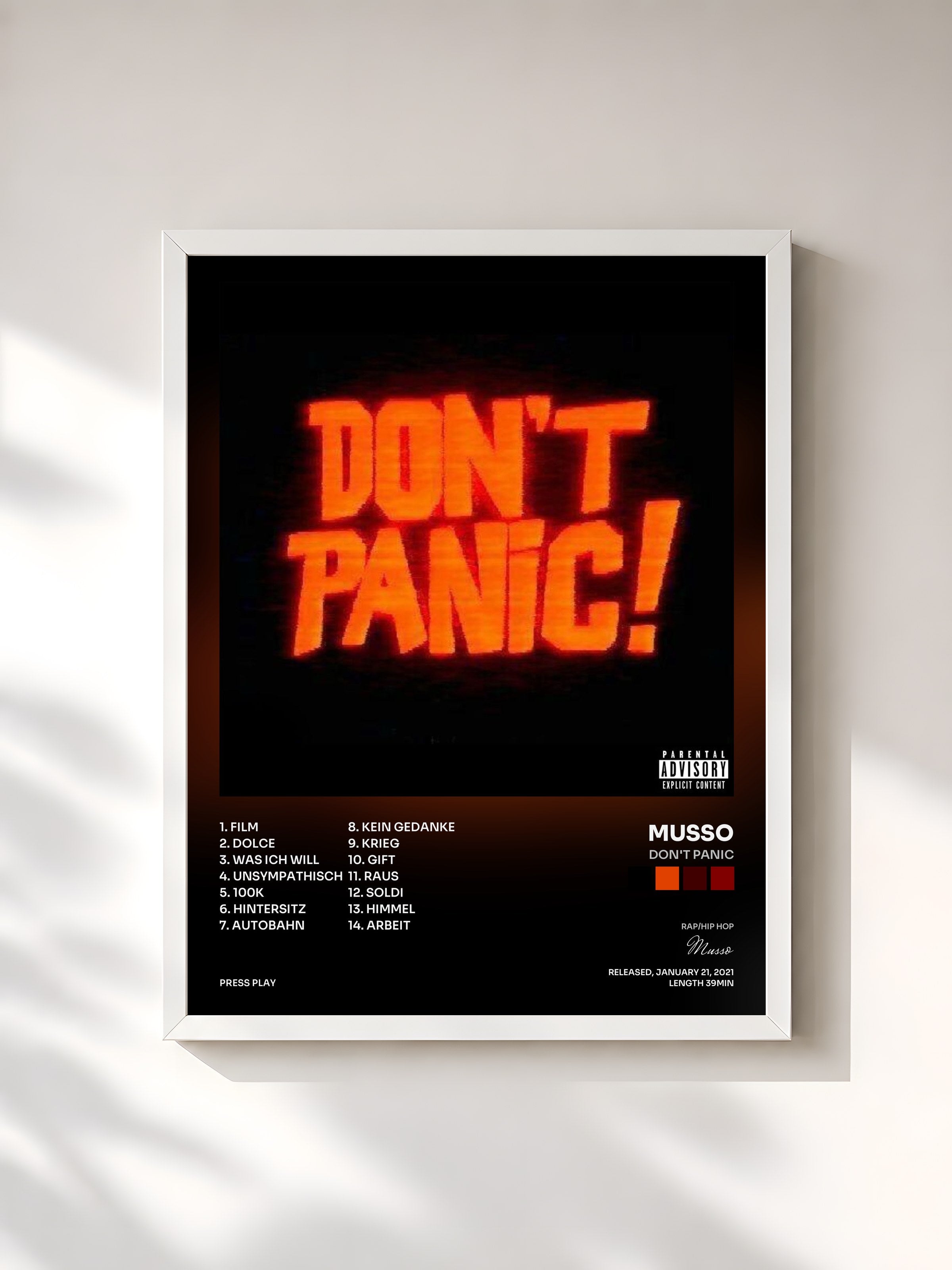 #blanc Tableau de l'album Don't Panic de Musso, cadre blanc, imprimé et encadré en France