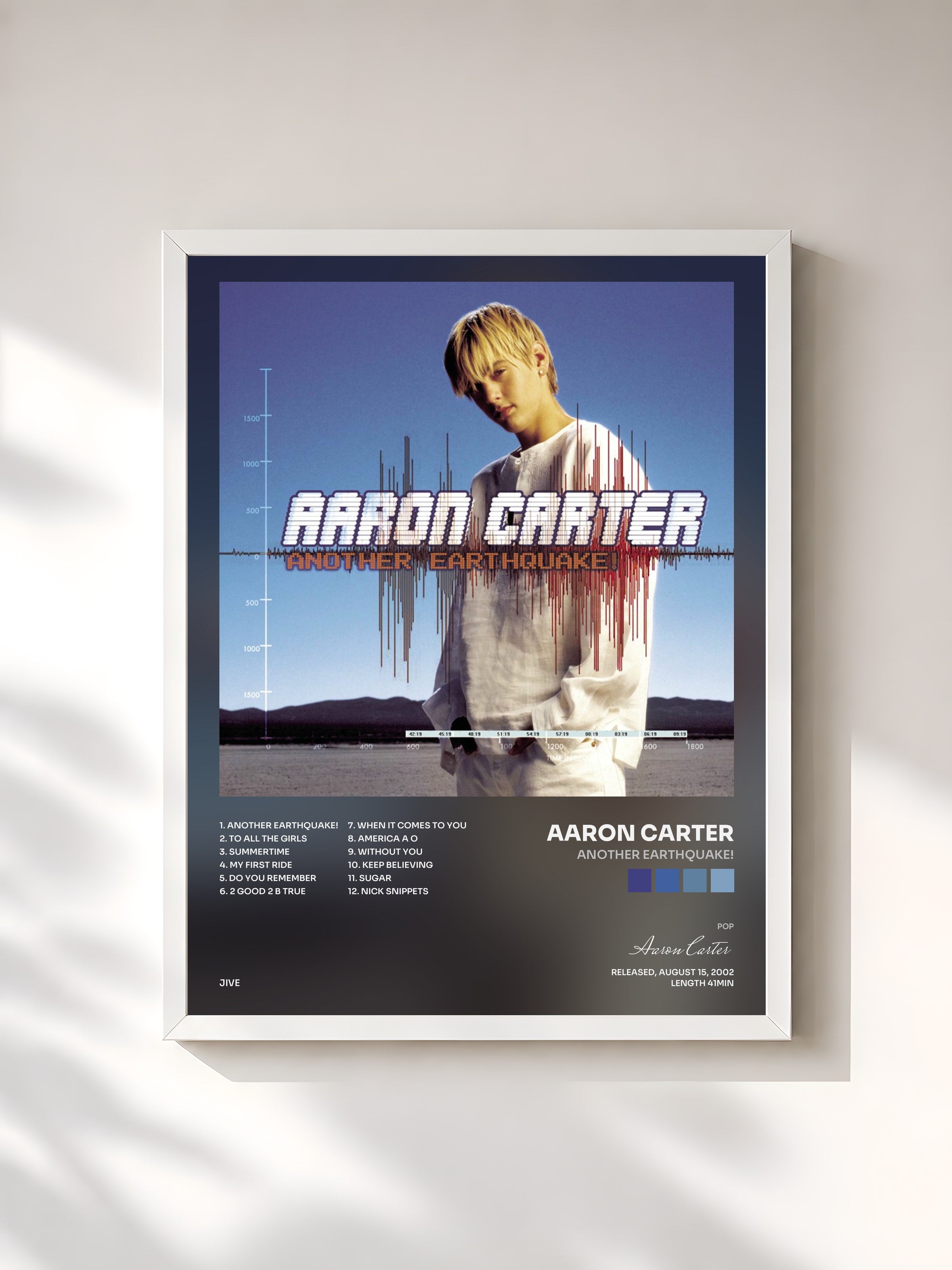 #blanc Tableau de l'album Another Earthquake! de Aaron Carter, cadre blanc, imprimé et encadré en France