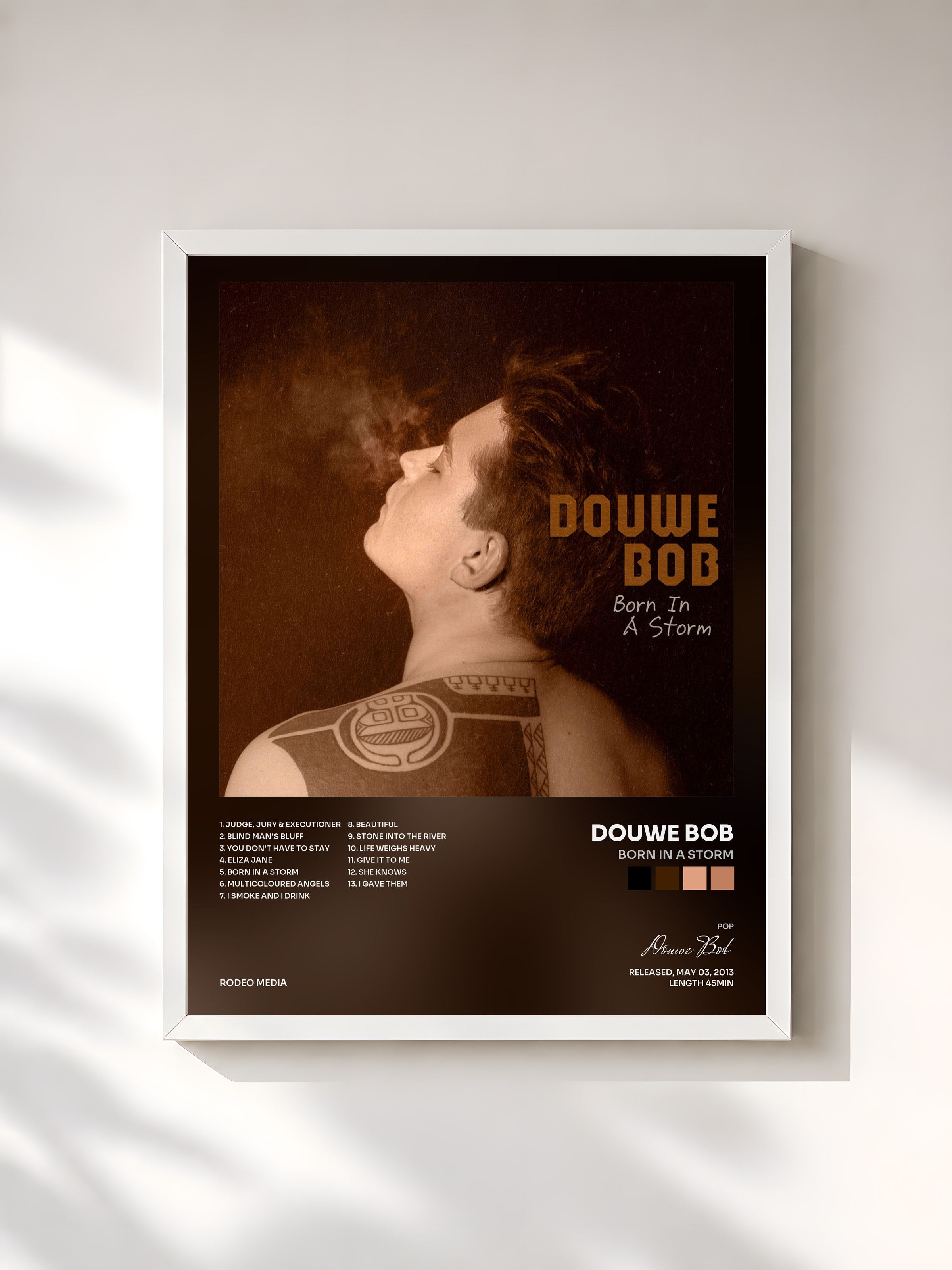 #blanc Tableau de l'album Born In A Storm de Douwe Bob, cadre blanc, imprimé et encadré en France