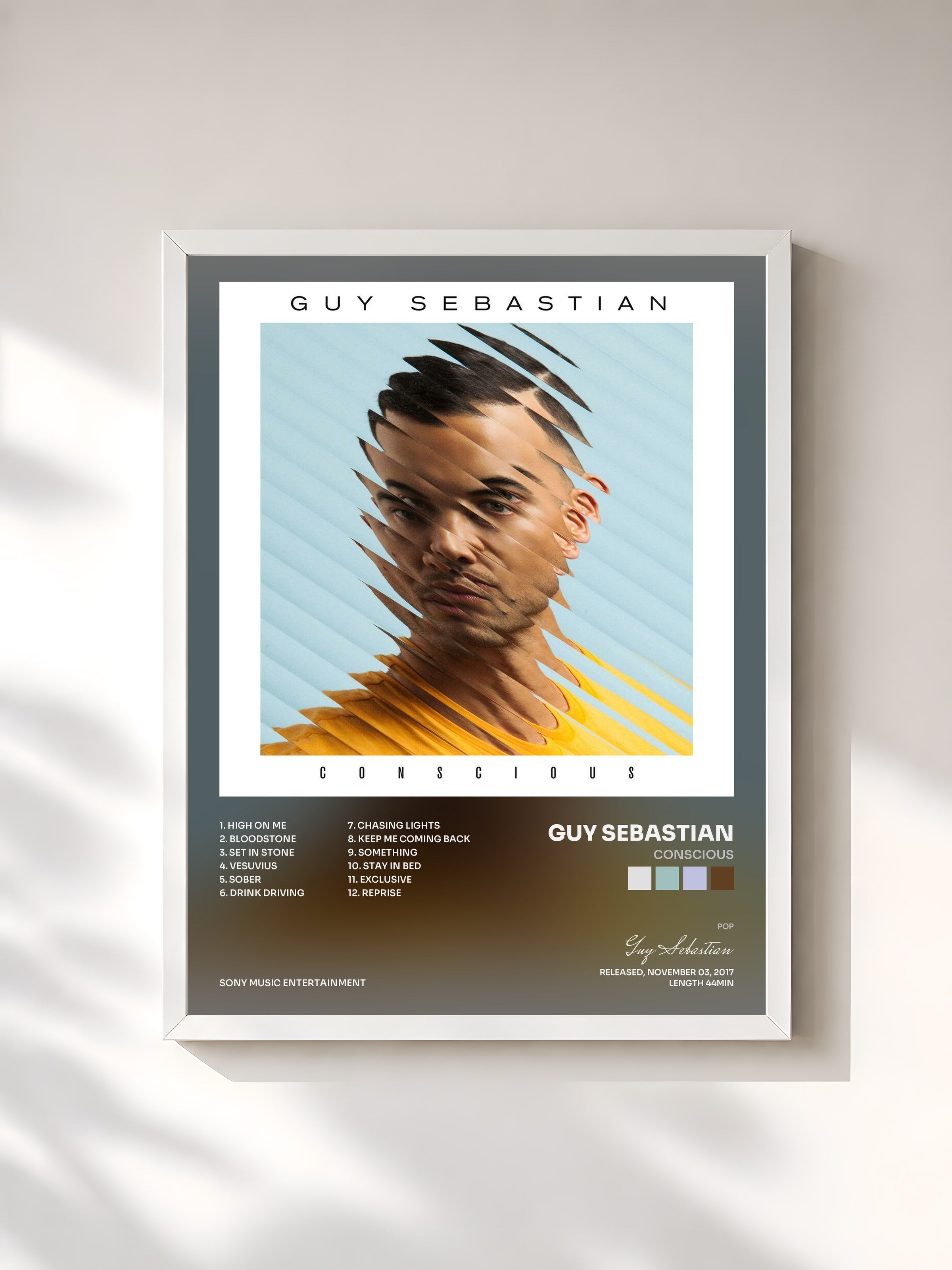 #blanc Tableau de l'album Conscious de Guy Sebastian, cadre blanc, imprimé et encadré en France