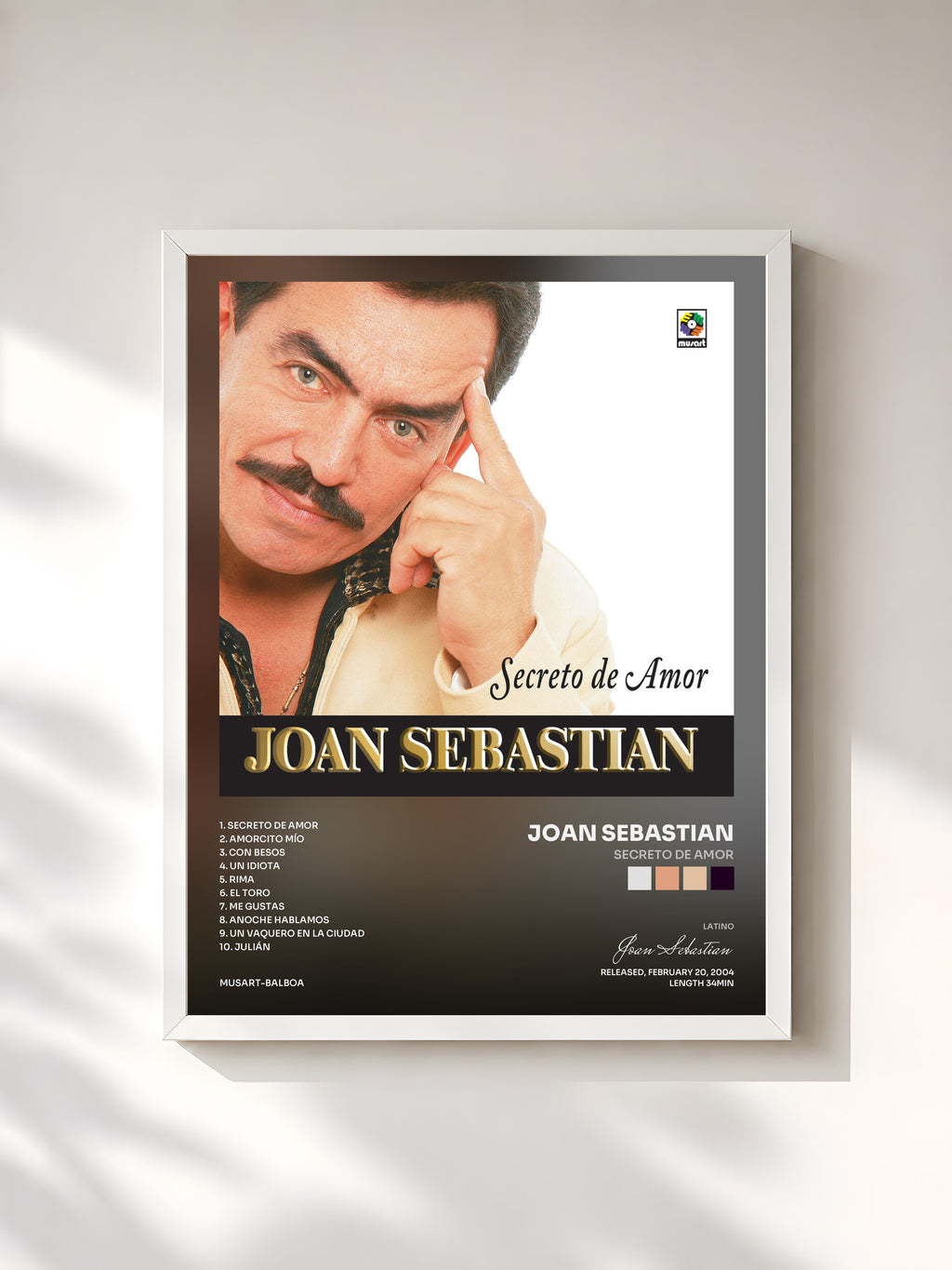 #blanc Secreto De Amor by Joan Sebastian as a framed art print, white frame, printed and framed in France