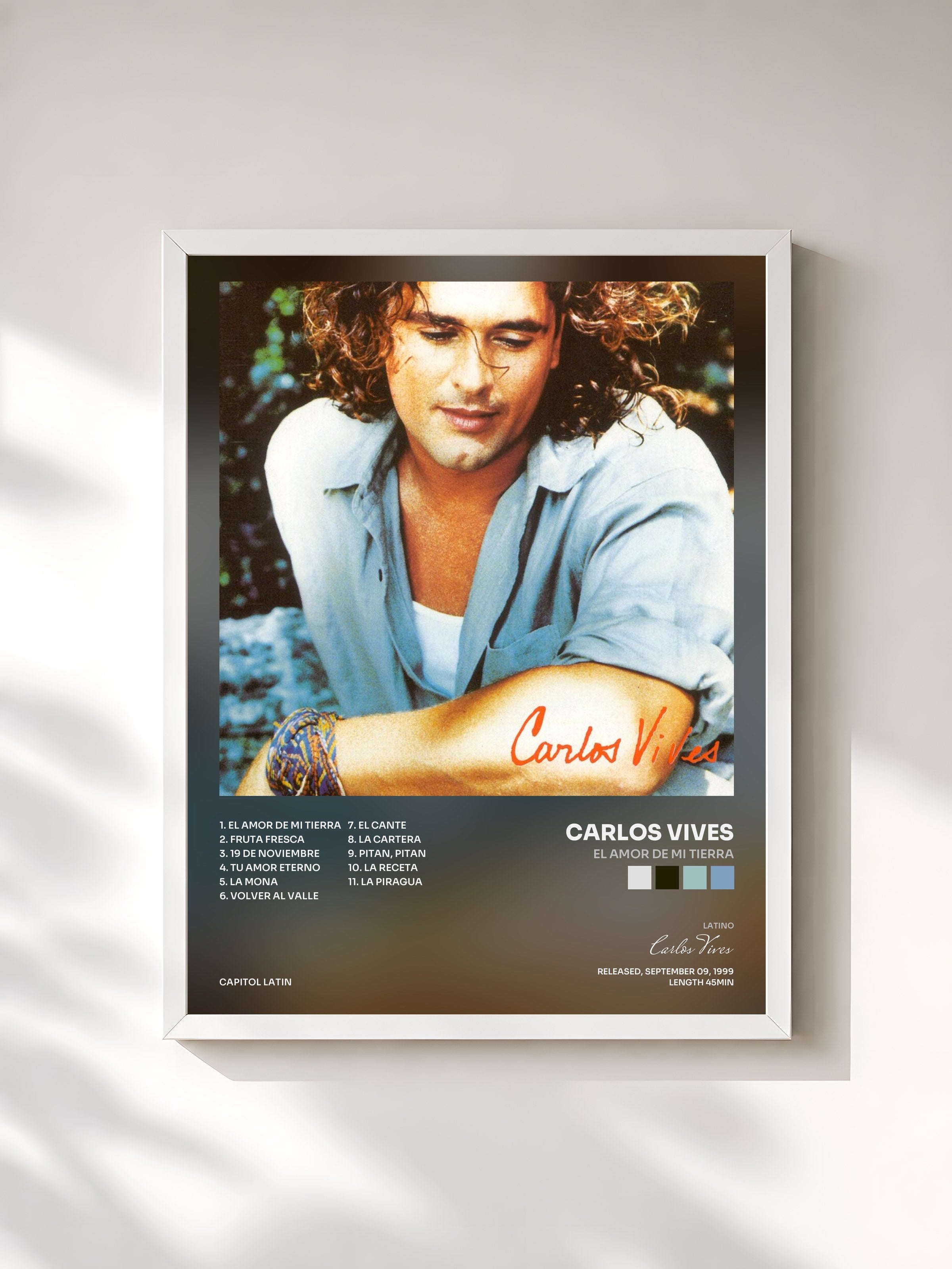 #blanc Tableau de l'album El Amor De Mi Tierra de Carlos Vives, cadre blanc, imprimé et encadré en France
