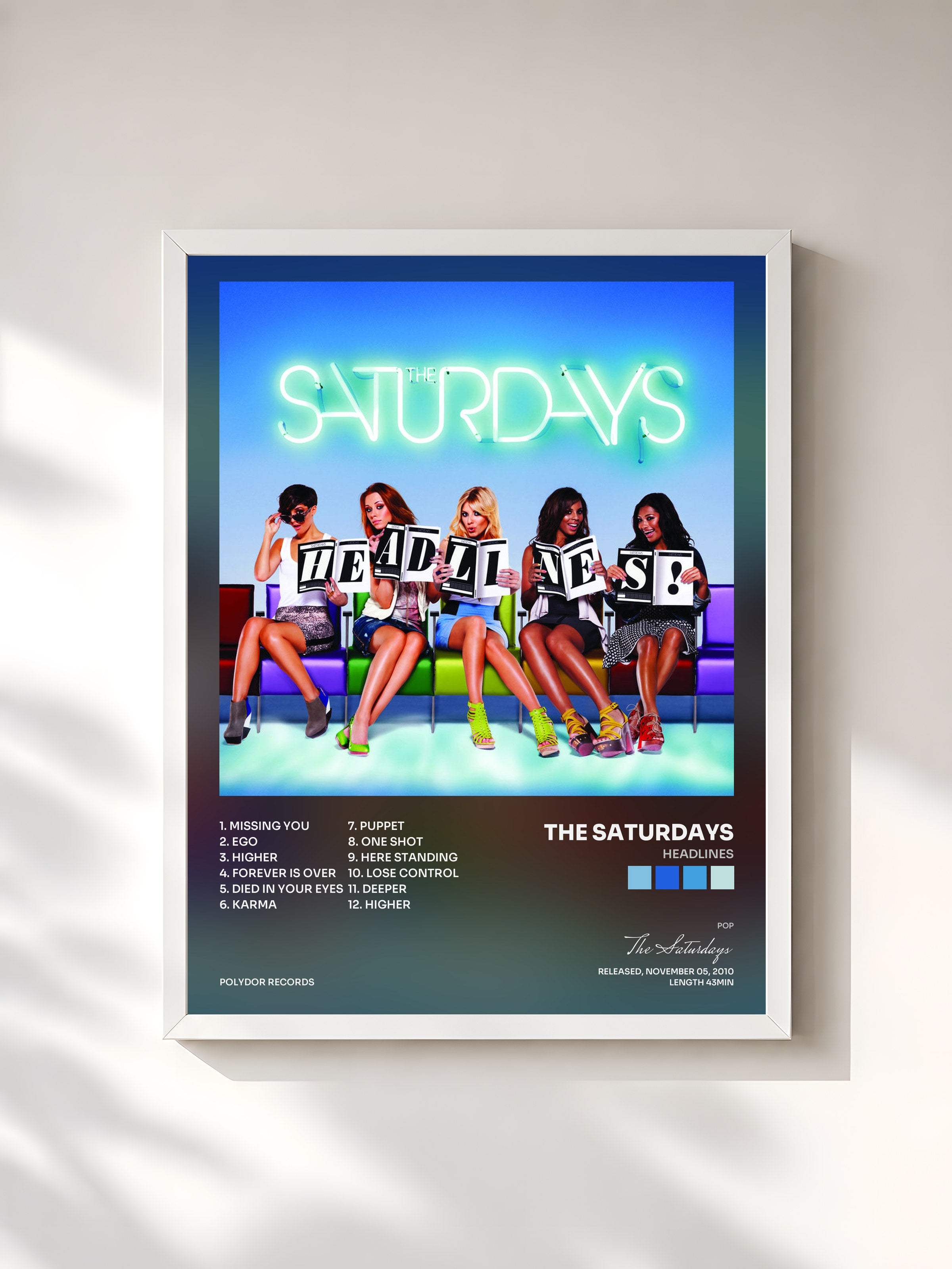 #blanc Tableau de l'album Headlines de The Saturdays, cadre blanc, imprimé et encadré en France