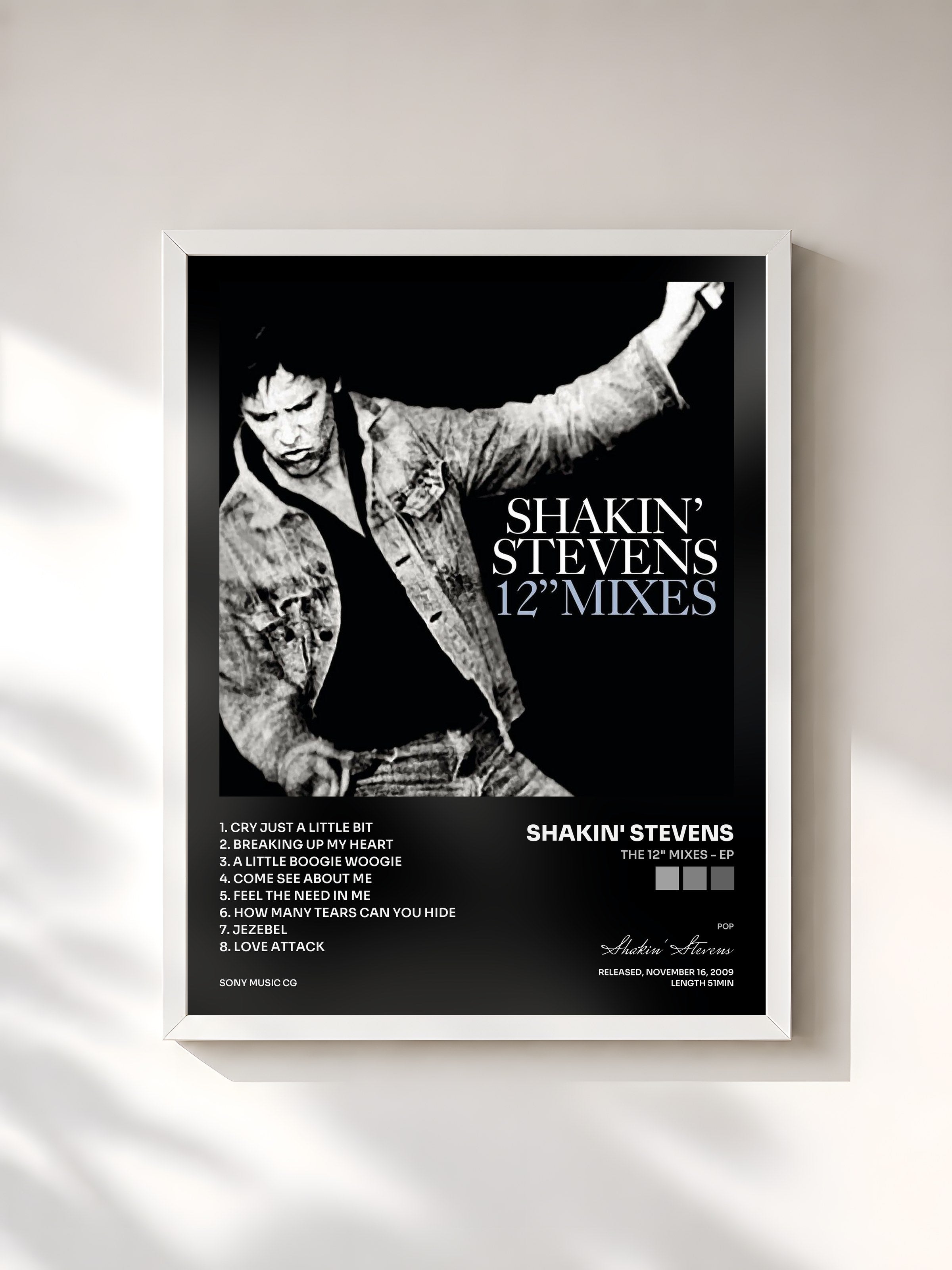 #blanc Tableau de l'album The 12" Mixes - EP de Shakin' Stevens, cadre blanc, imprimé et encadré en France