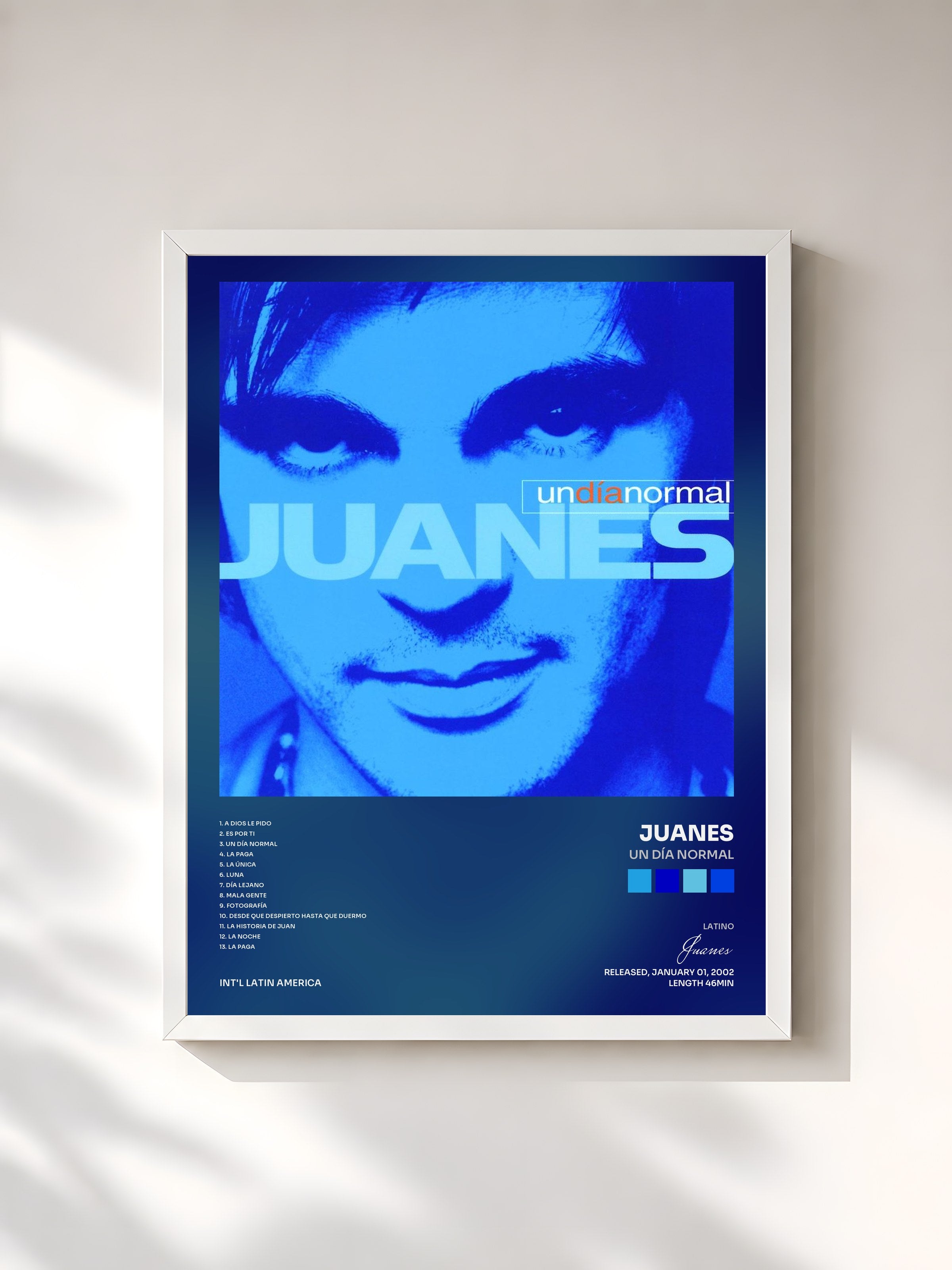 #blanc Tableau de l'album Un Día Normal de Juanes, cadre blanc, imprimé et encadré en France