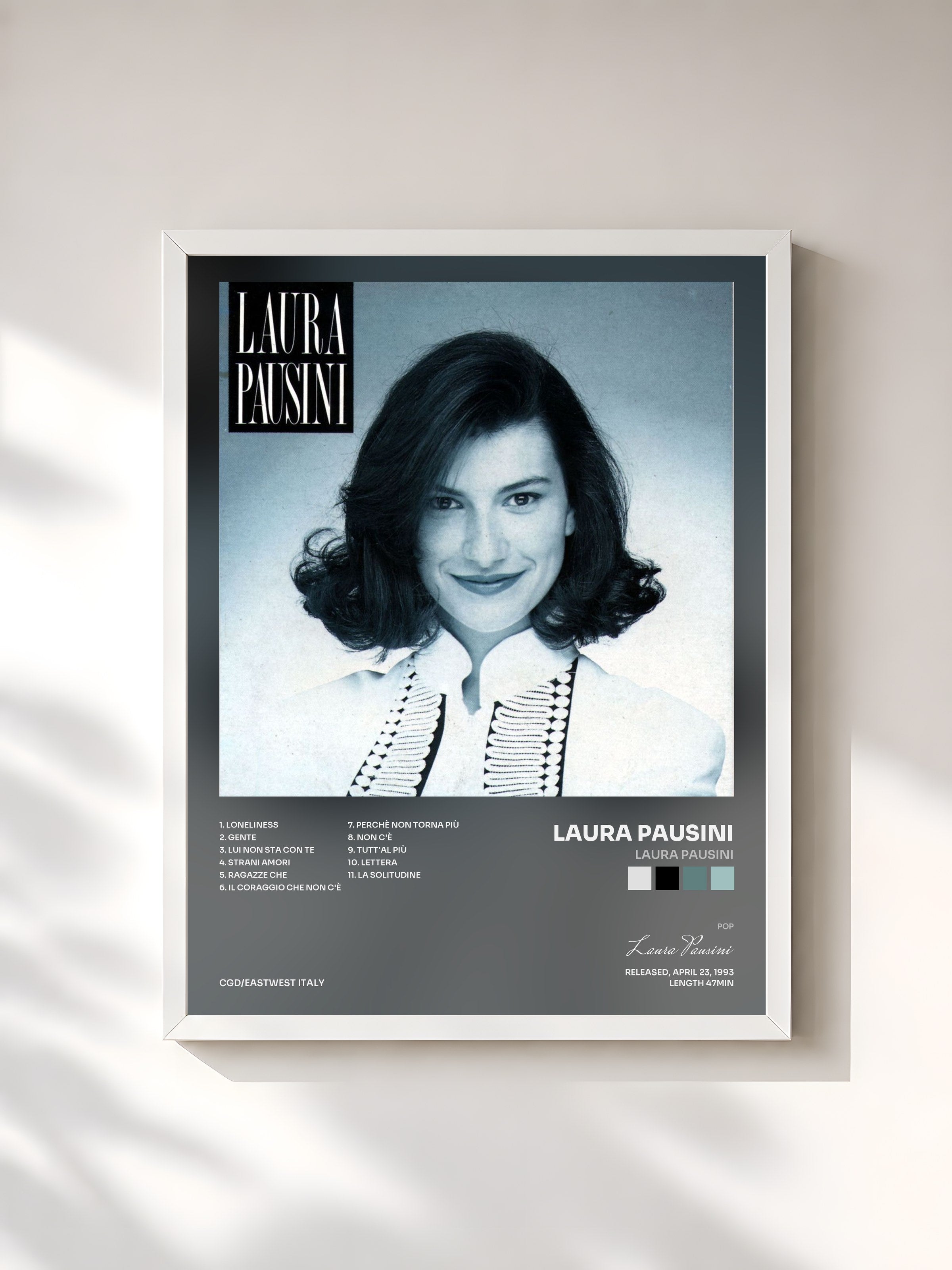 #blanc Tableau de l'album Laura Pausini de Laura Pausini, cadre blanc, imprimé et encadré en France