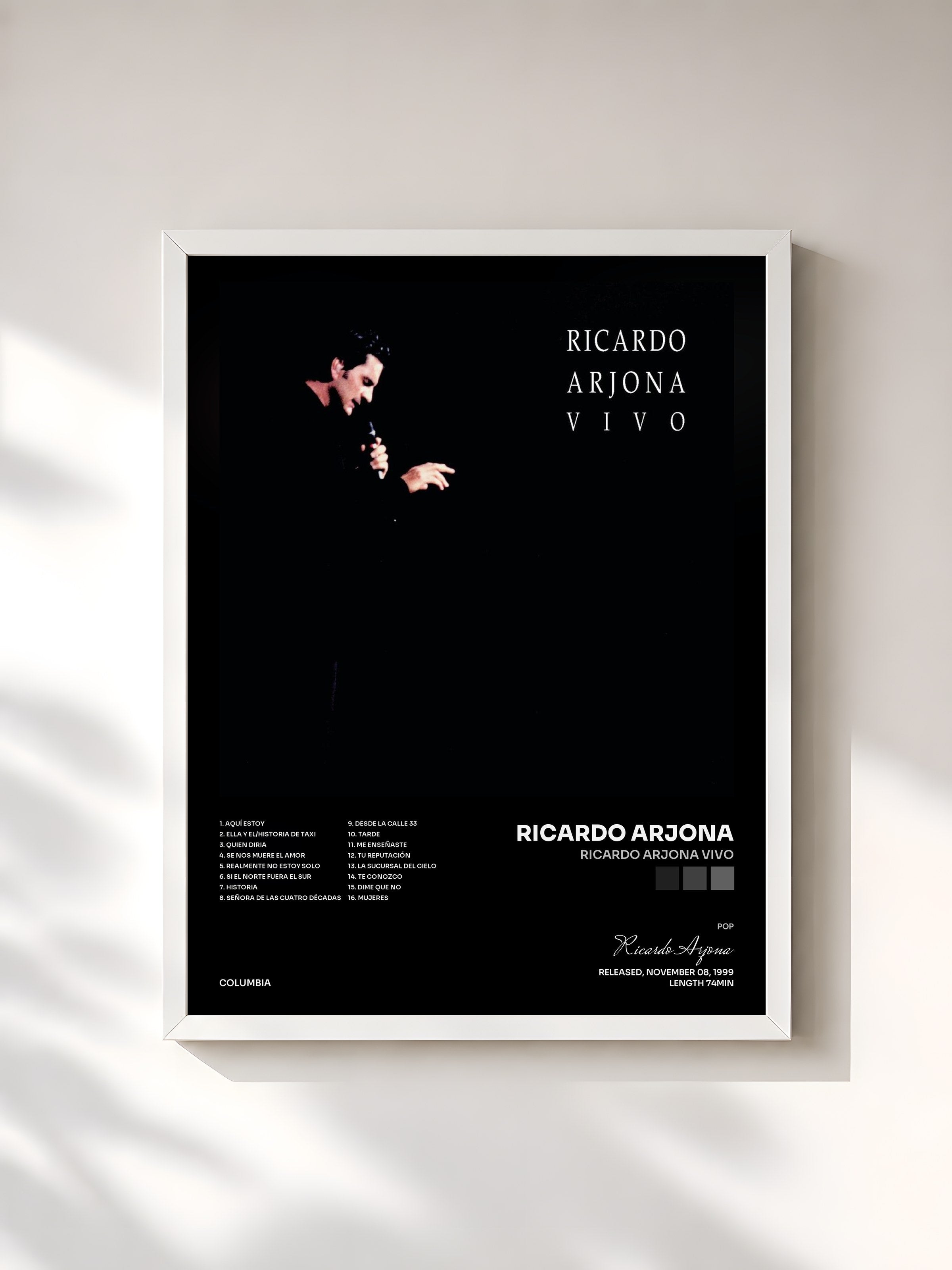 #blanc Tableau de l'album Ricardo Arjona Vivo de Ricardo Arjona, cadre blanc, imprimé et encadré en France