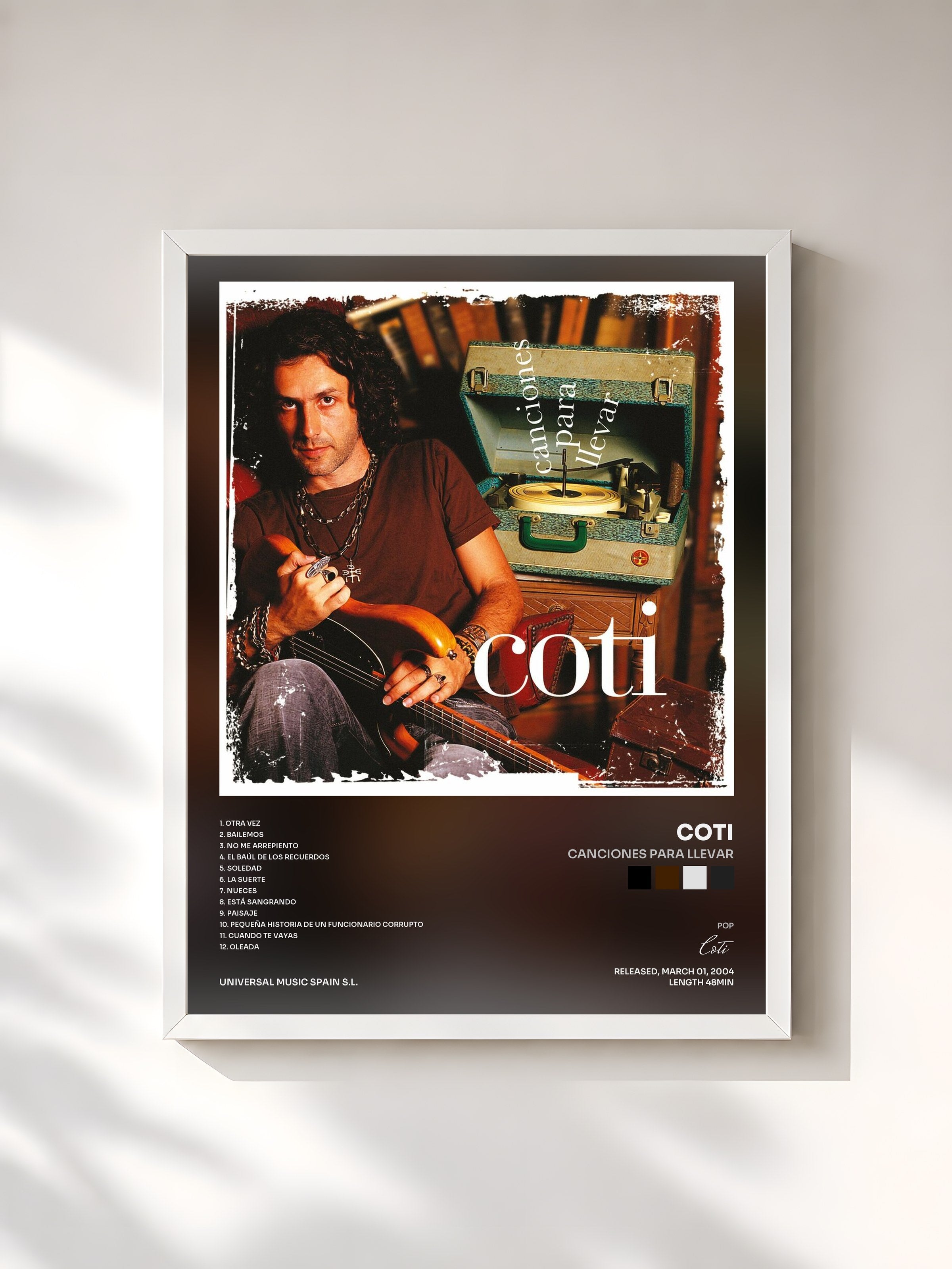 #blanc Tableau de l'album Canciones Para Llevar de Coti, cadre blanc, imprimé et encadré en France