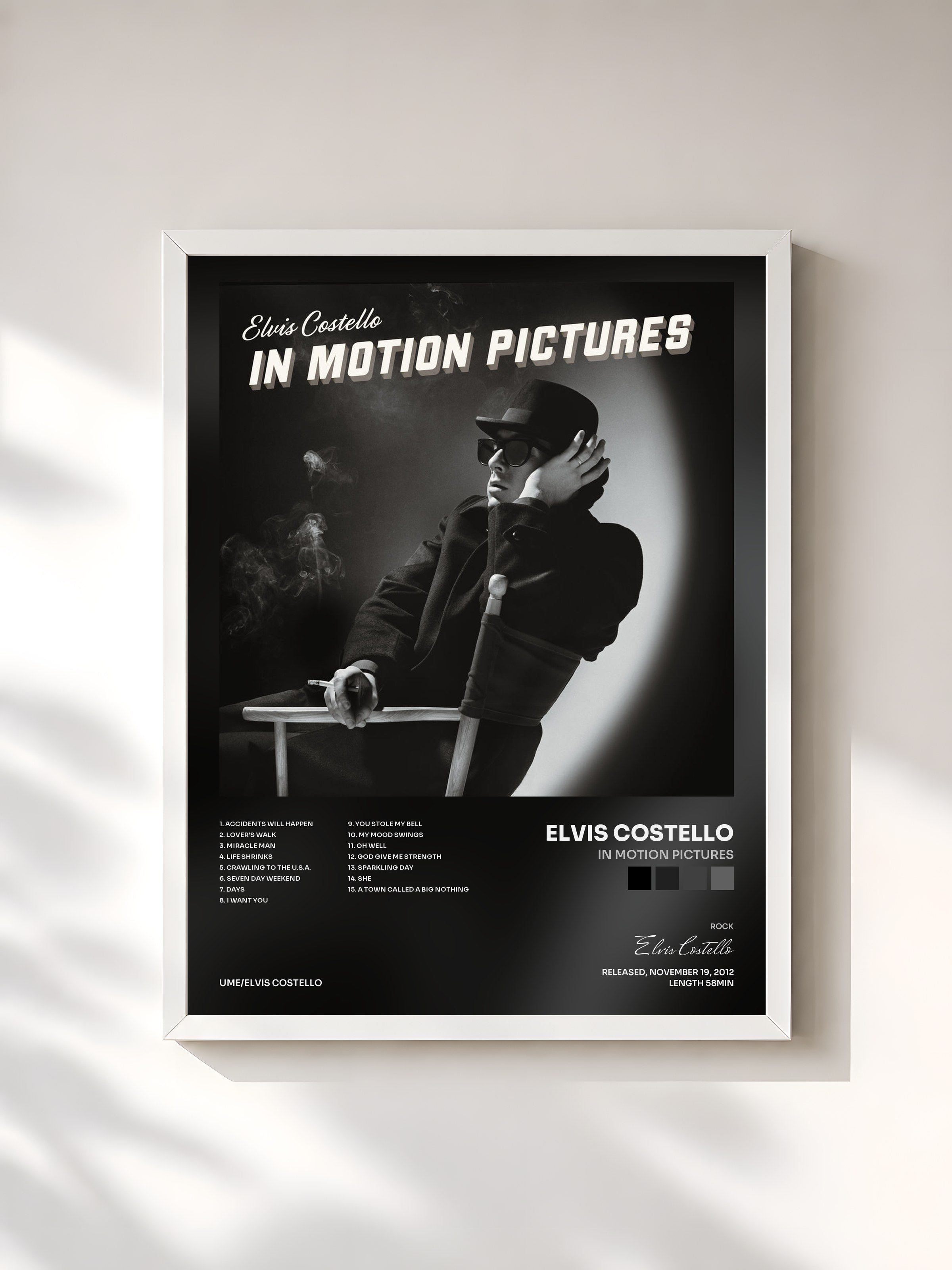 #blanc Tableau de l'album In Motion Pictures de Elvis Costello, cadre blanc, imprimé et encadré en France