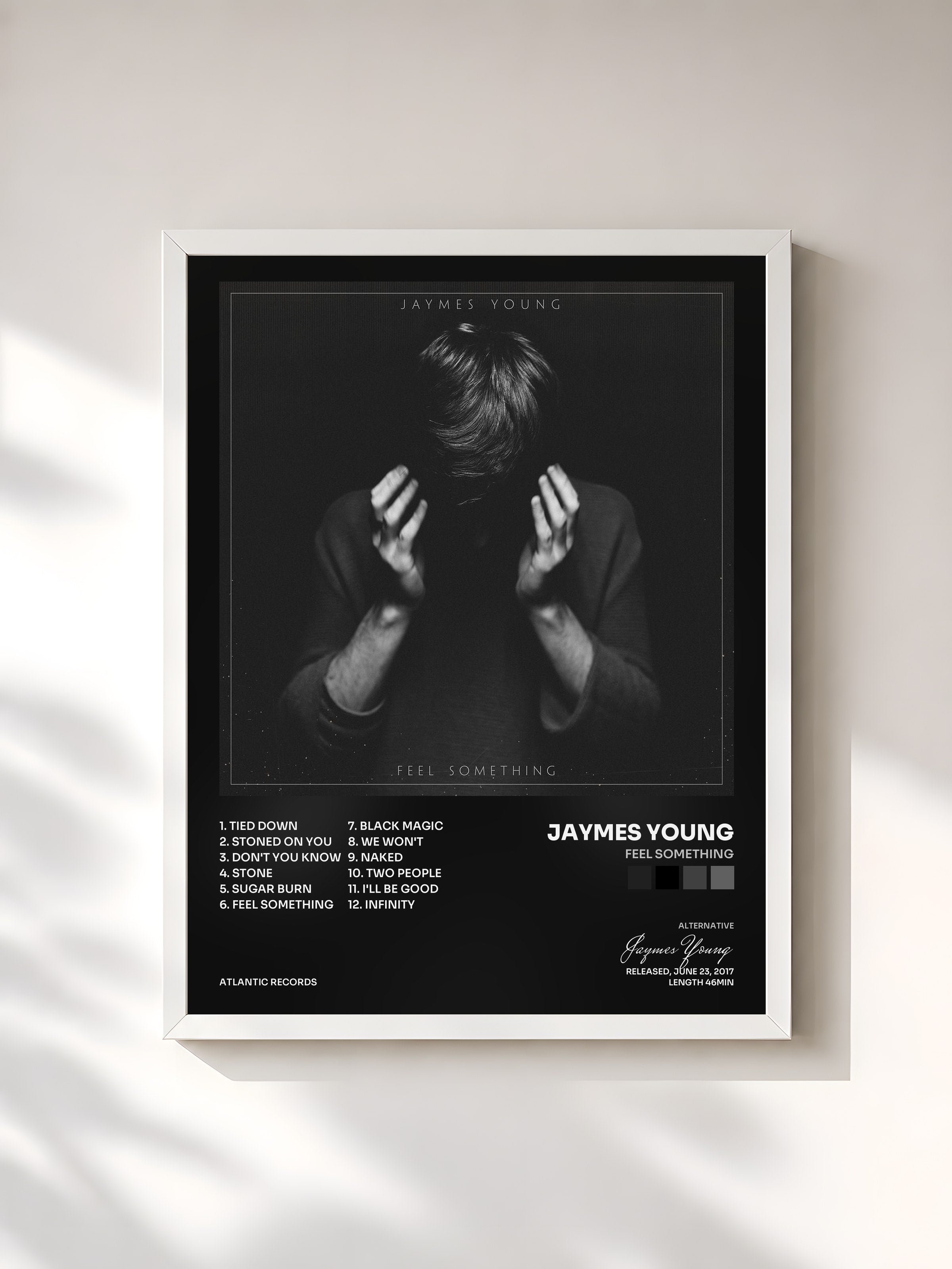 #blanc Tableau de l'album Feel Something de Jaymes Young, cadre blanc, imprimé et encadré en France
