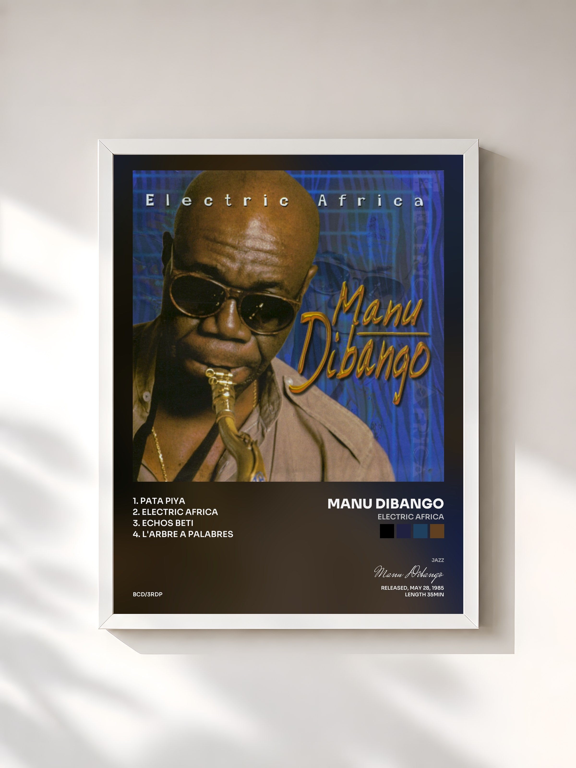 #blanc Tableau de l'album Electric Africa de Manu Dibango, cadre blanc, imprimé et encadré en France