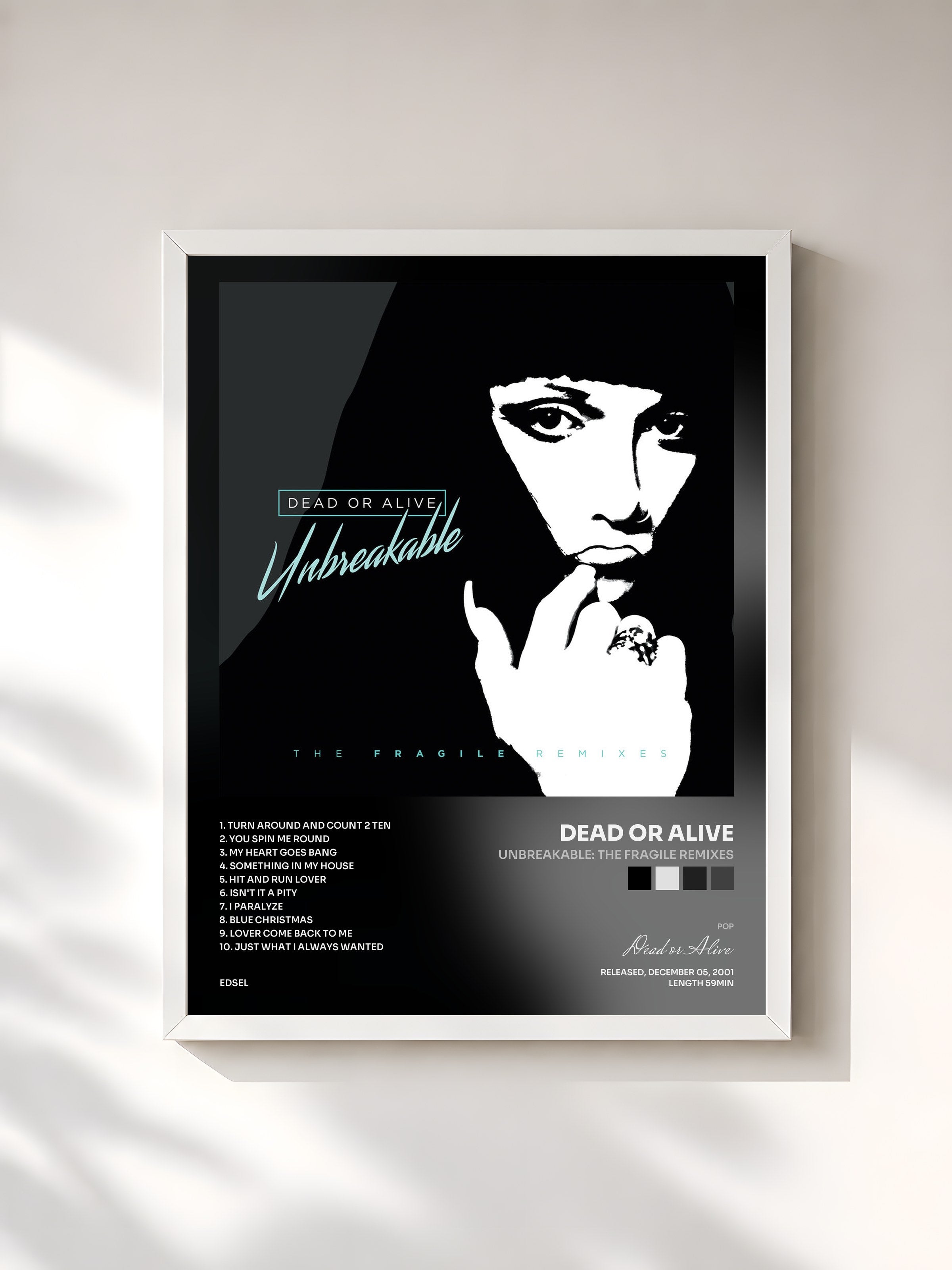 #blanc Tableau de l'album Unbreakable: The Fragile Remixes de Dead or Alive, cadre blanc, imprimé et encadré en France