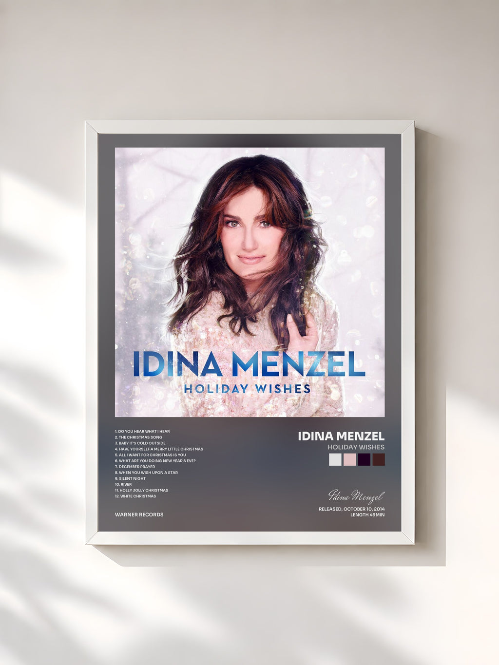 #blanc Holiday Wishes by Idina Menzel as a framed art print, white frame, printed and framed in France