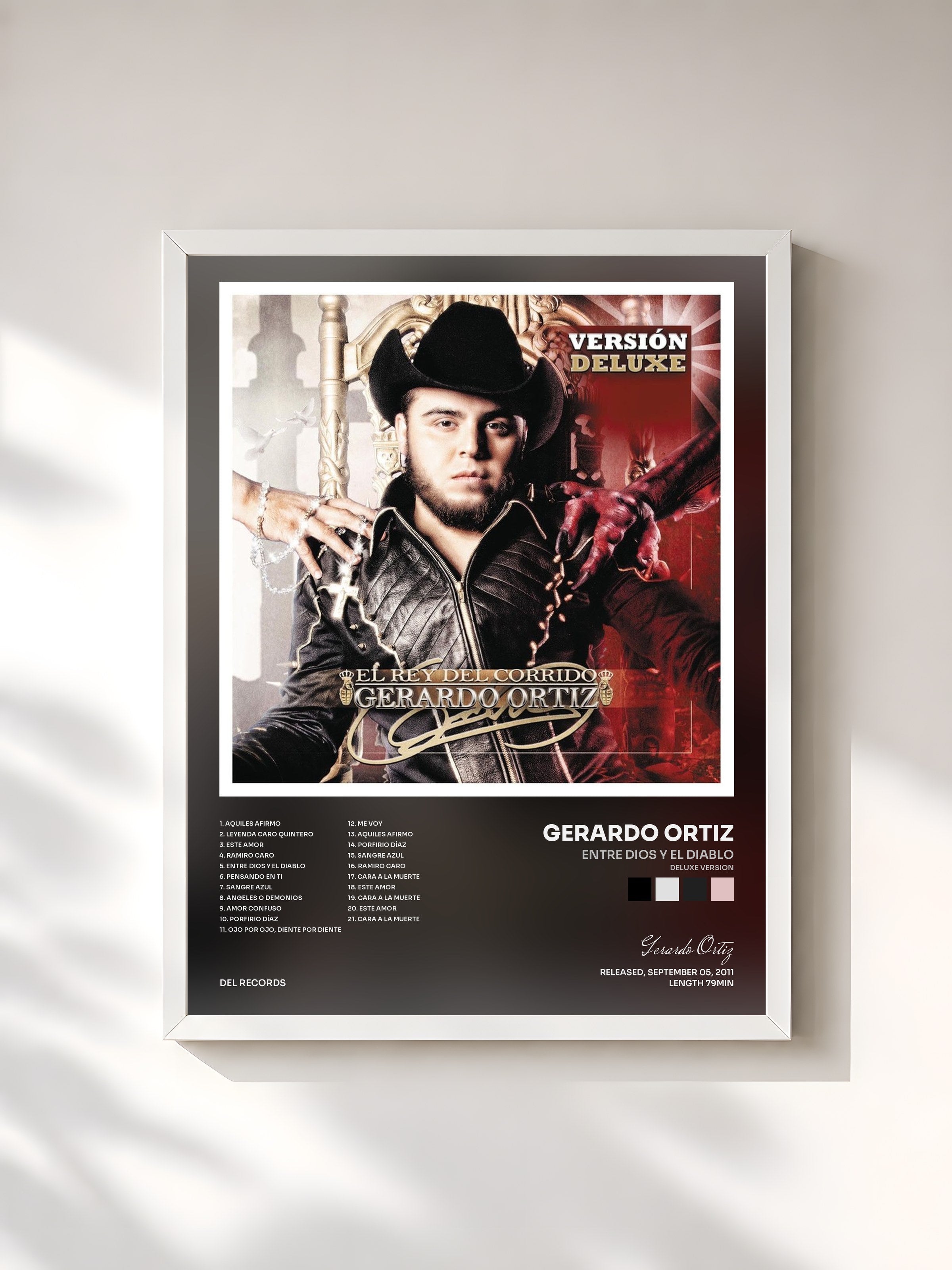 #blanc Tableau de l'album Entre Dios y El Diablo (Deluxe Version) de Gerardo Ortiz, cadre blanc, imprimé et encadré en France