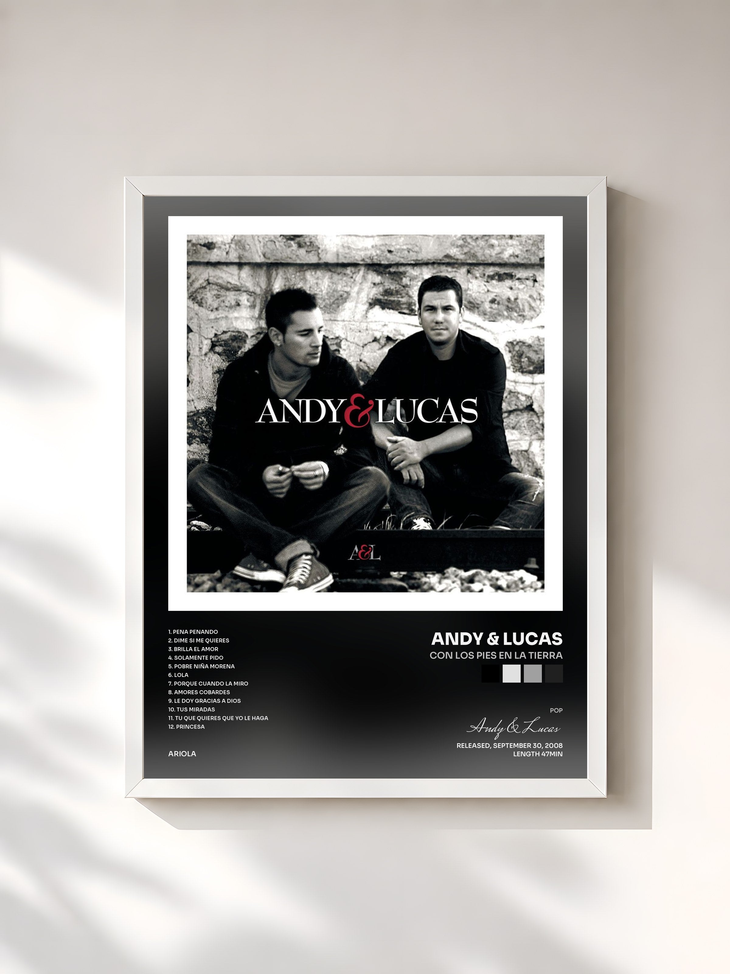 #blanc Tableau de l'album Con Los Pies En La Tierra de Andy & Lucas, cadre blanc, imprimé et encadré en France