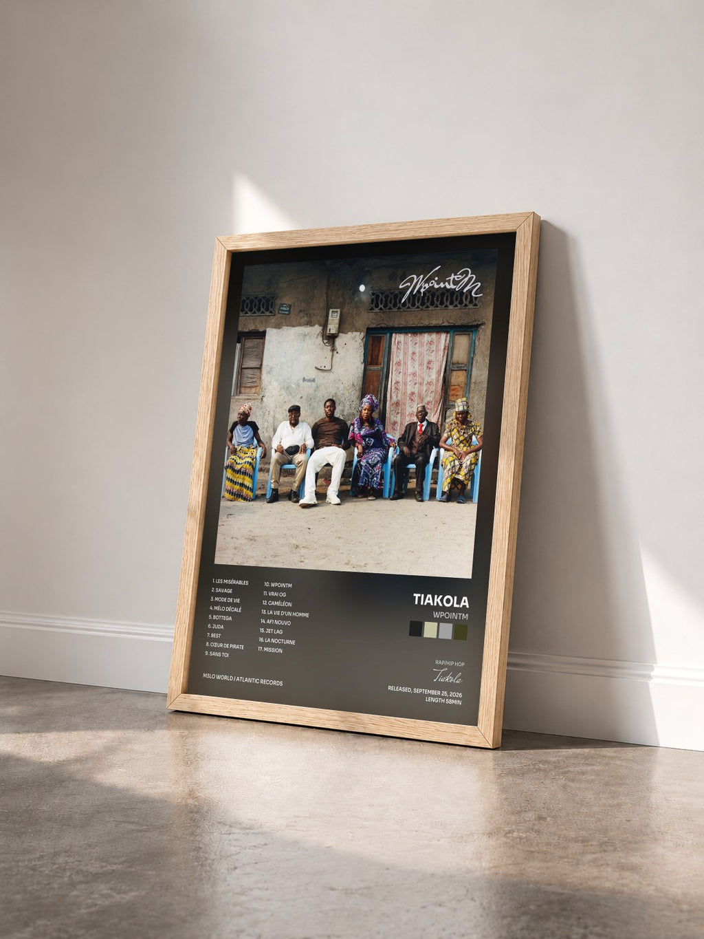 #bois Tableau de l'album WpointM de Tiakola vu de trois quarts, cadre en bois brut