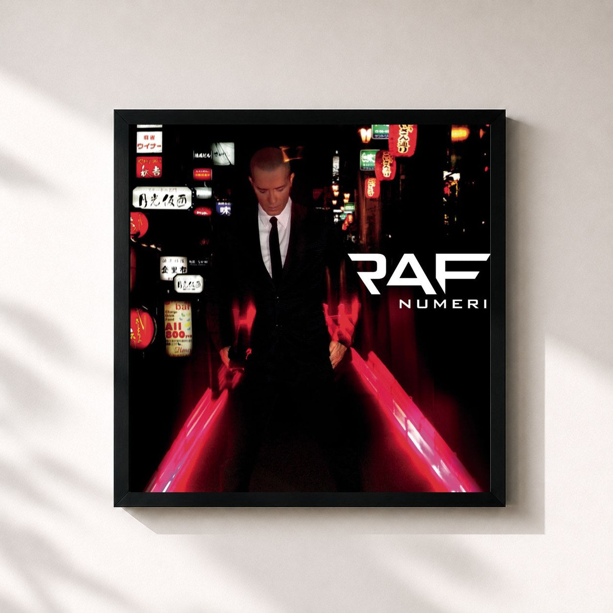 #noir Tableau carré de l'album Numeri de Raf, cadre noir 32x32 cm