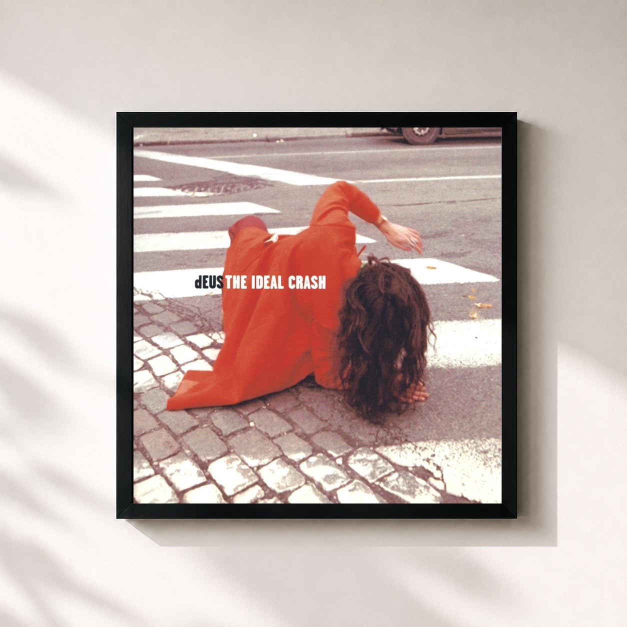 #noir Tableau carré de l'album The Ideal Crash de dEUS, cadre noir 32x32 cm
