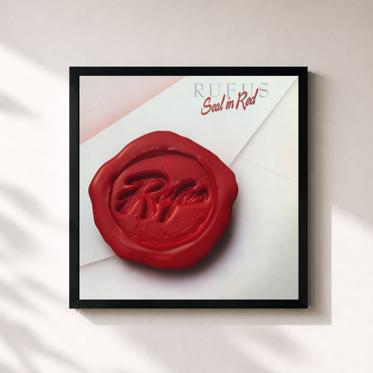 #noir Tableau carré de l'album Seal In Red de Rufus, cadre noir 32x32 cm