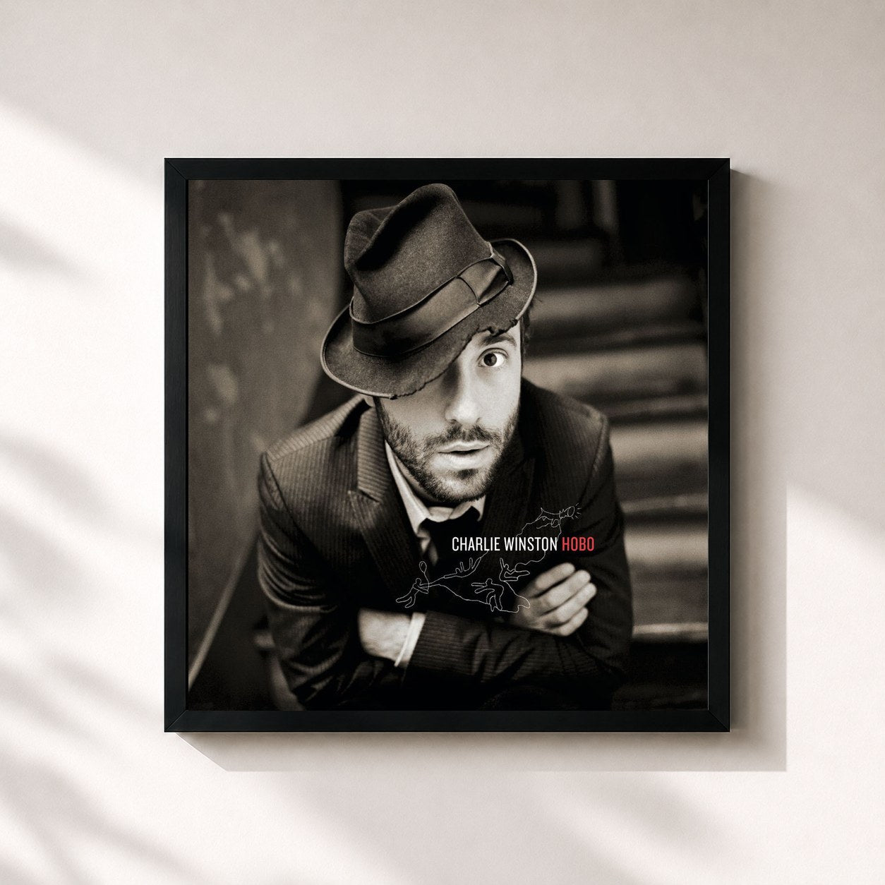 #noir Tableau carré de l'album Hobo de Charlie Winston, cadre noir 32x32 cm