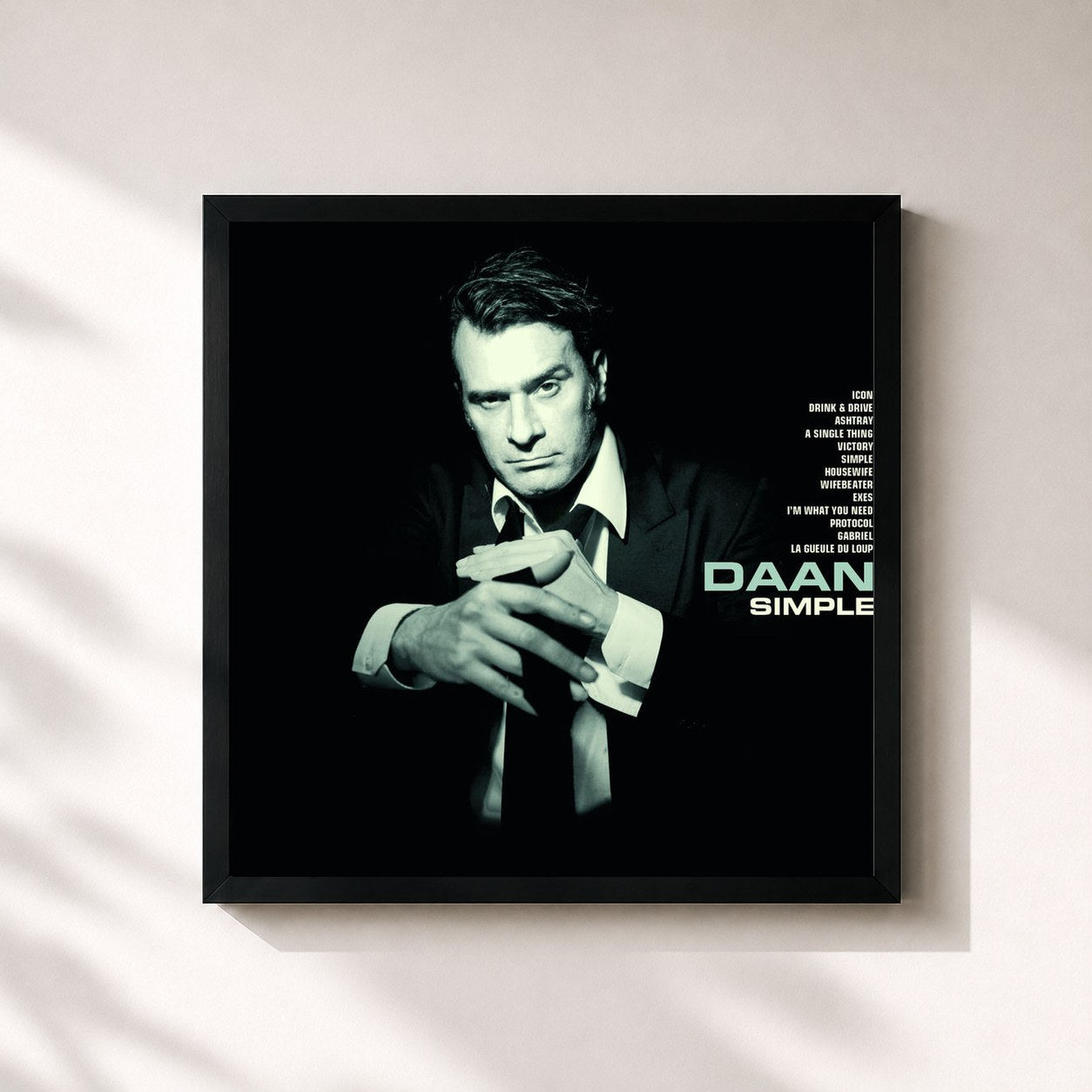 #noir Tableau carré de l'album Simple de Daan, cadre noir 32x32 cm