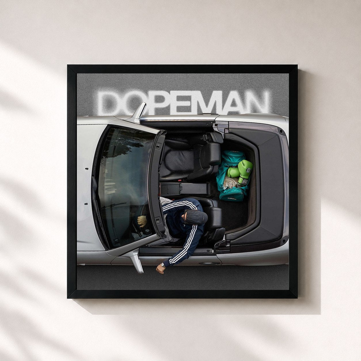 #noir Tableau carré de l'album Dopeman de Plusmacher, cadre noir 32x32 cm