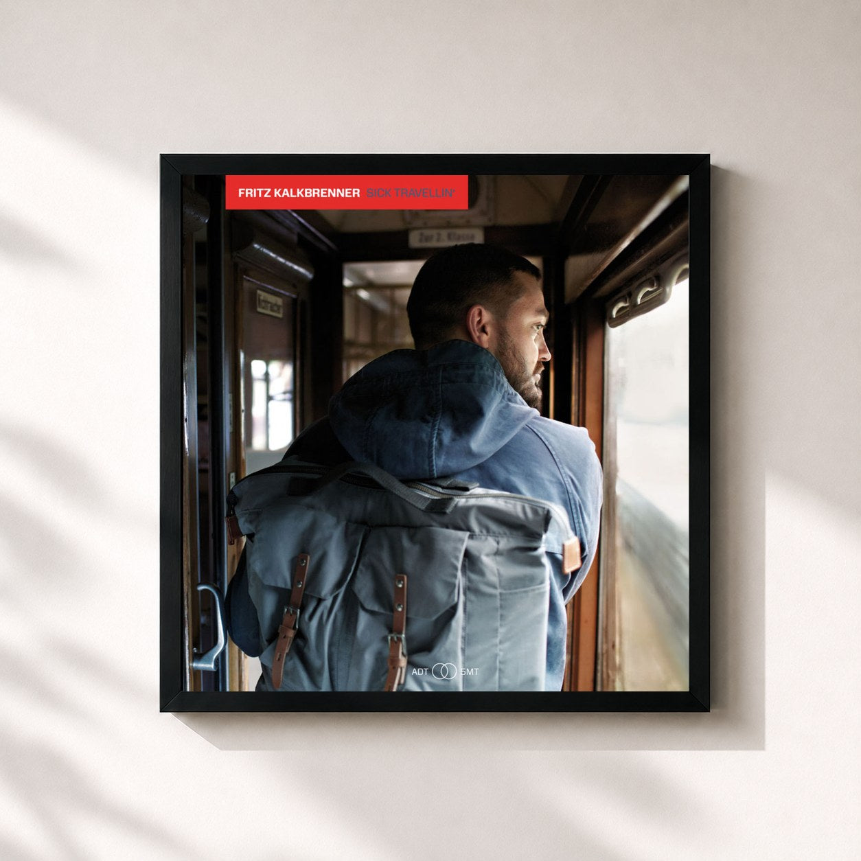 #noir Tableau carré de l'album Sick Travellin' de Fritz Kalkbrenner, cadre noir 32x32 cm