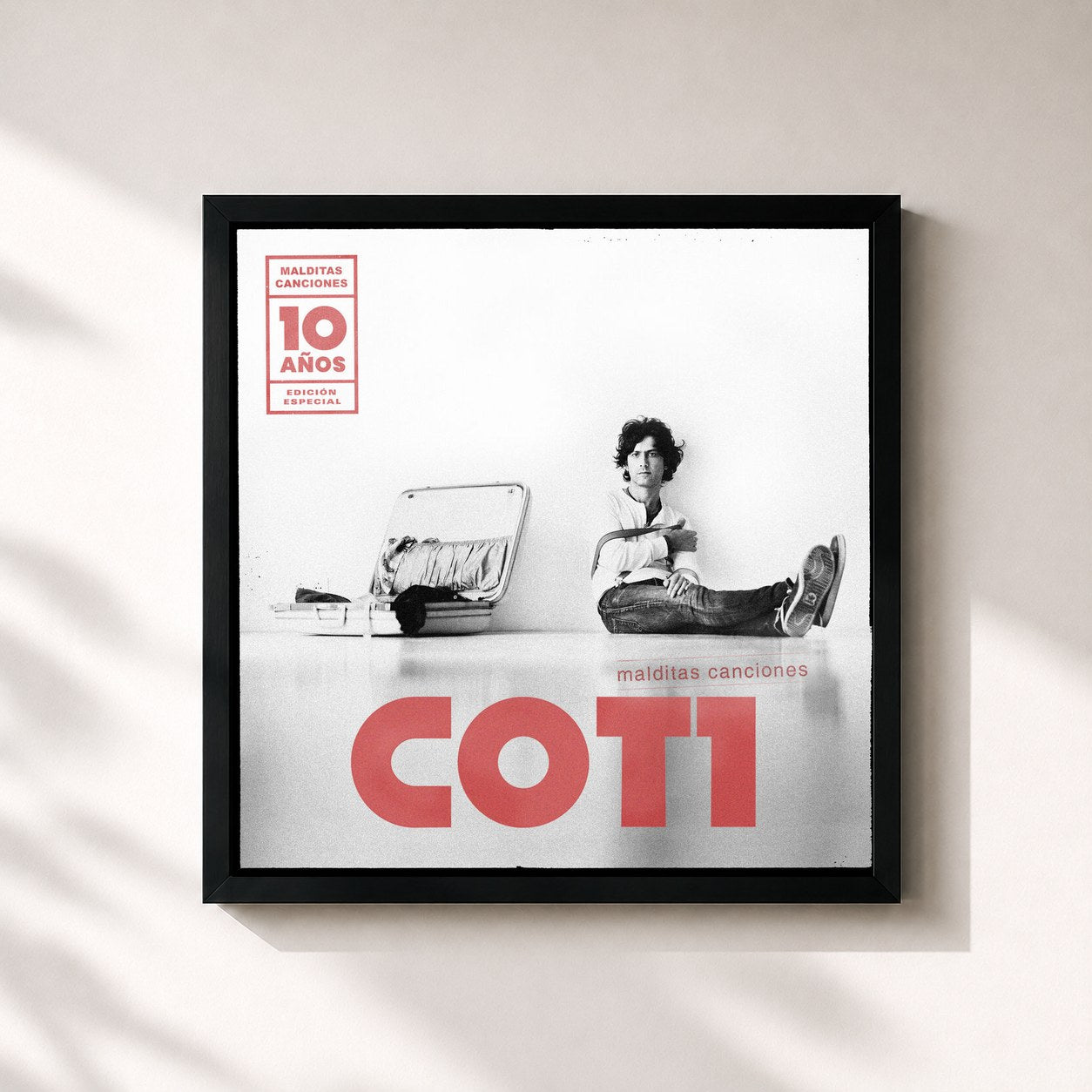 #noir Tableau carré de l'album Malditas Canciones (10 Años / Edición Especial 2019) de Coti, cadre noir 32x32 cm