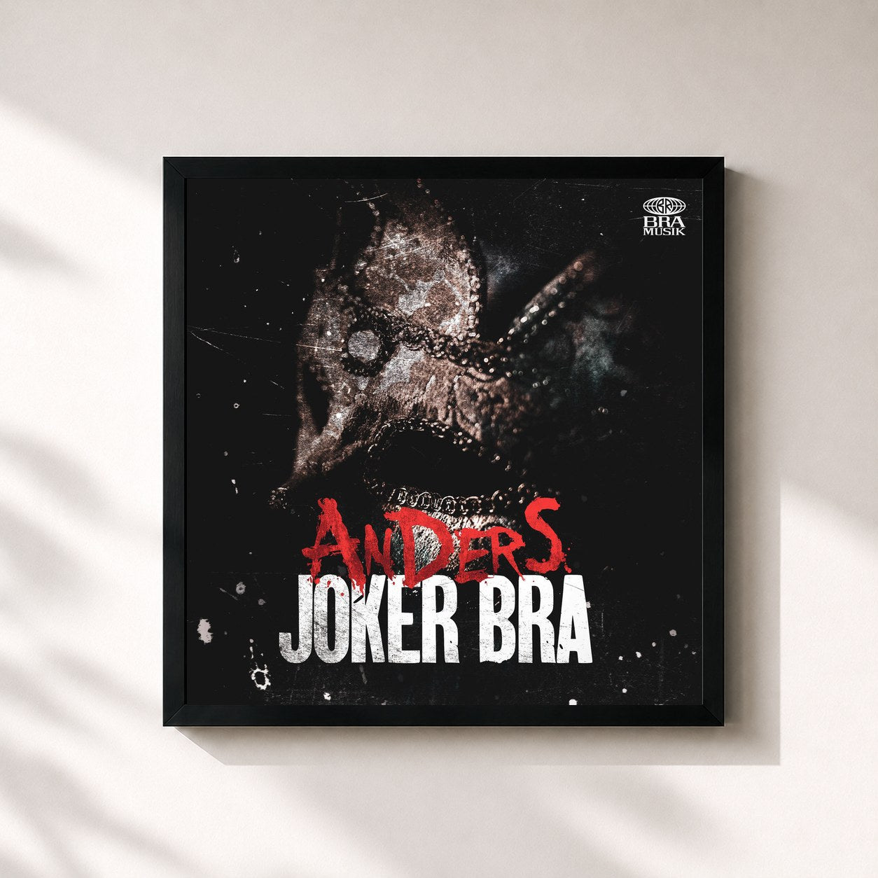 #noir Tableau carré de l'album ANDERS de Joker Bra, cadre noir 32x32 cm