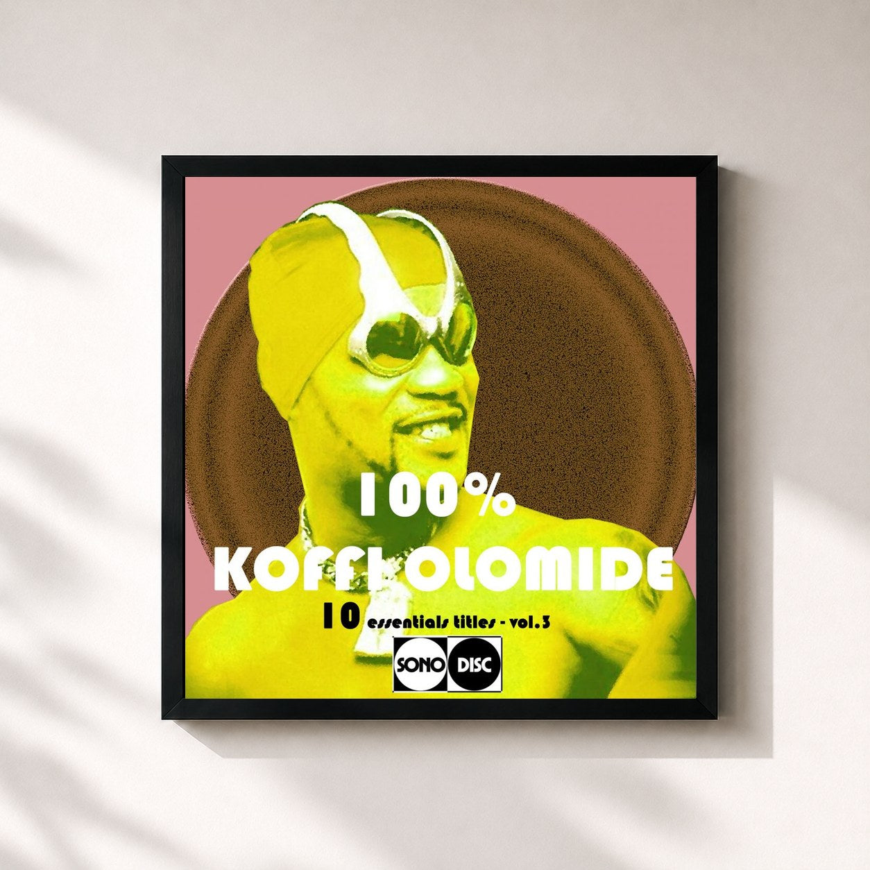 #noir Tableau carré de l'album 100% Koffi Olomide, vol. 3 (10 Essential Titles) de Koffi Olomidé, cadre noir 32x32 cm