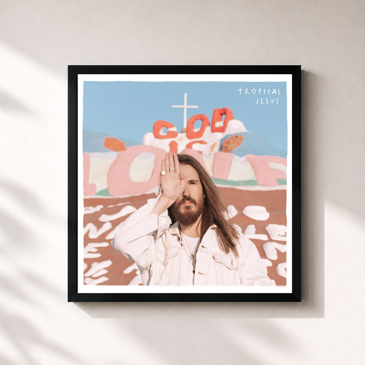 #noir Tableau carré de l'album Tropical Jesus de Carlos Sadness, cadre noir 32x32 cm