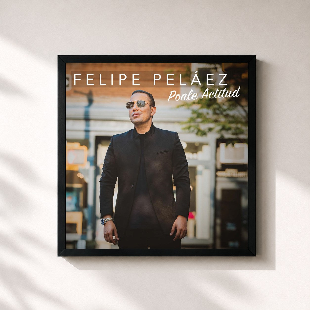 #noir Tableau carré de l'album Ponle Actitud de Felipe Peláez, cadre noir 32x32 cm