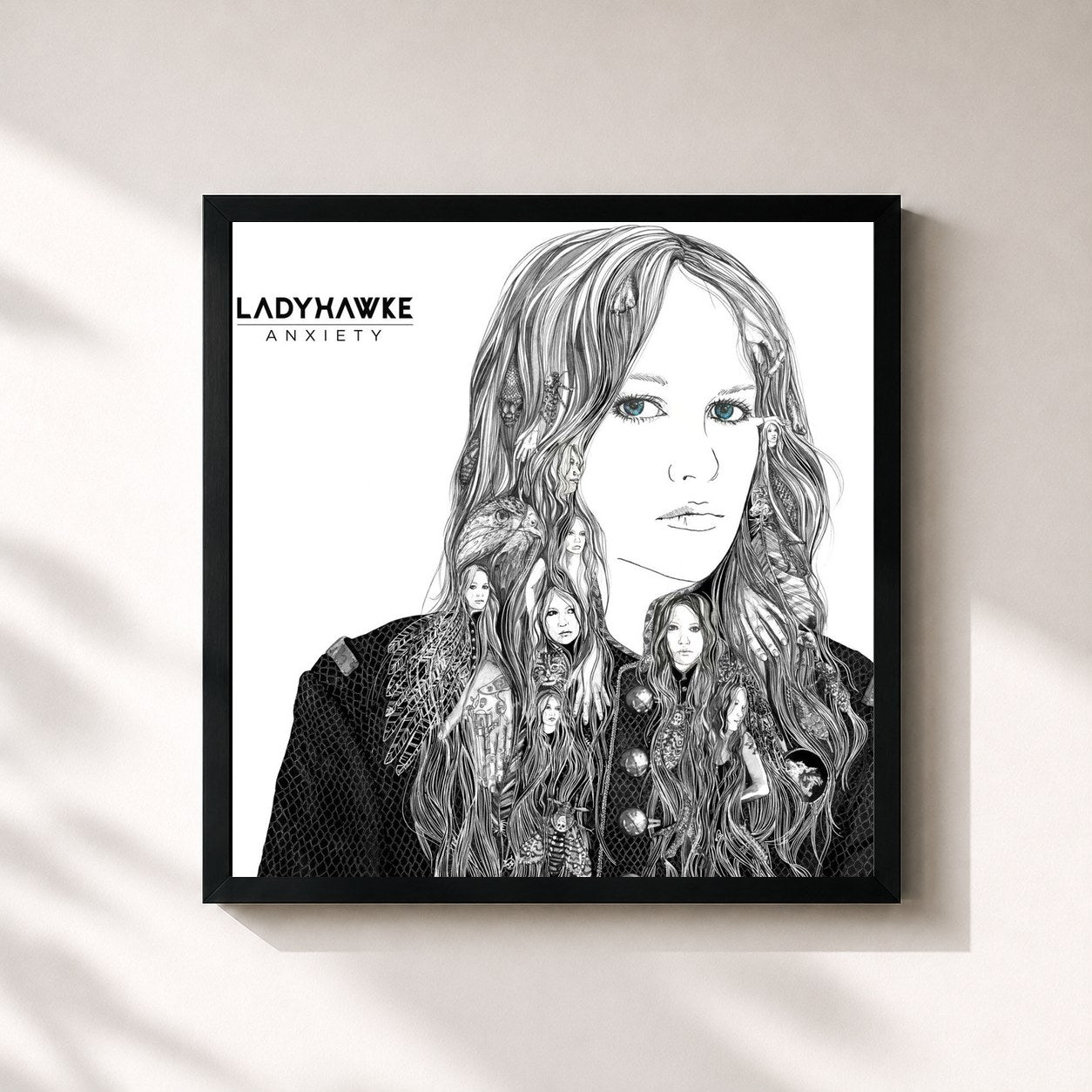 #noir Tableau carré de l'album Anxiety de Ladyhawke, cadre noir 32x32 cm
