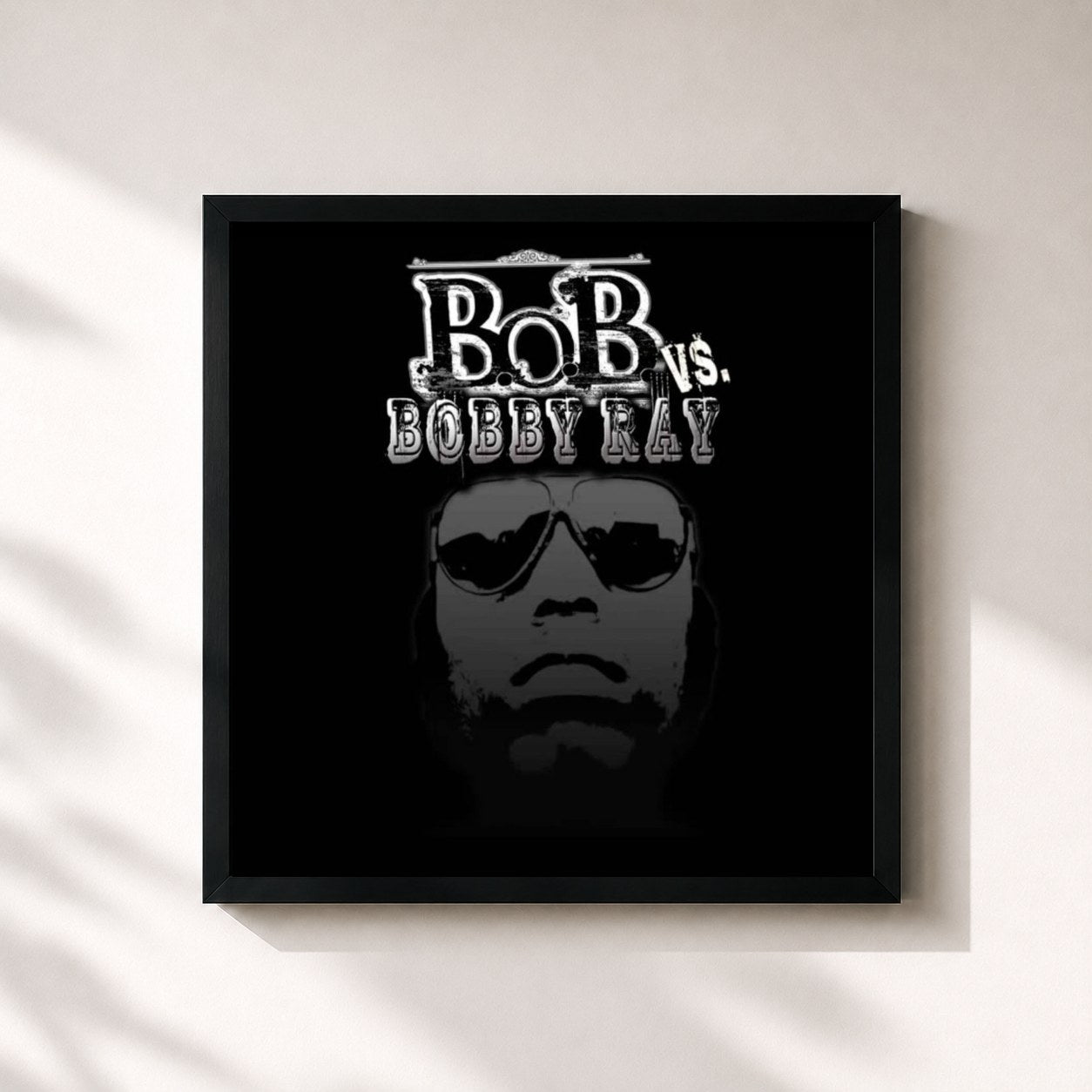 #noir Tableau carré de l'album Bob vs Bobby Ray de B.o.B, cadre noir 32x32 cm